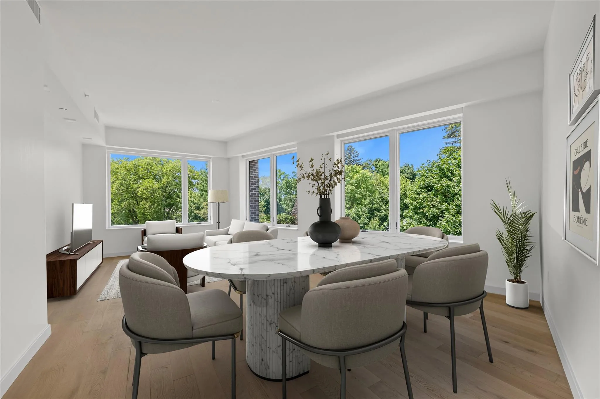 Dining space with light wood finished floors Dining space with light wood finished floors