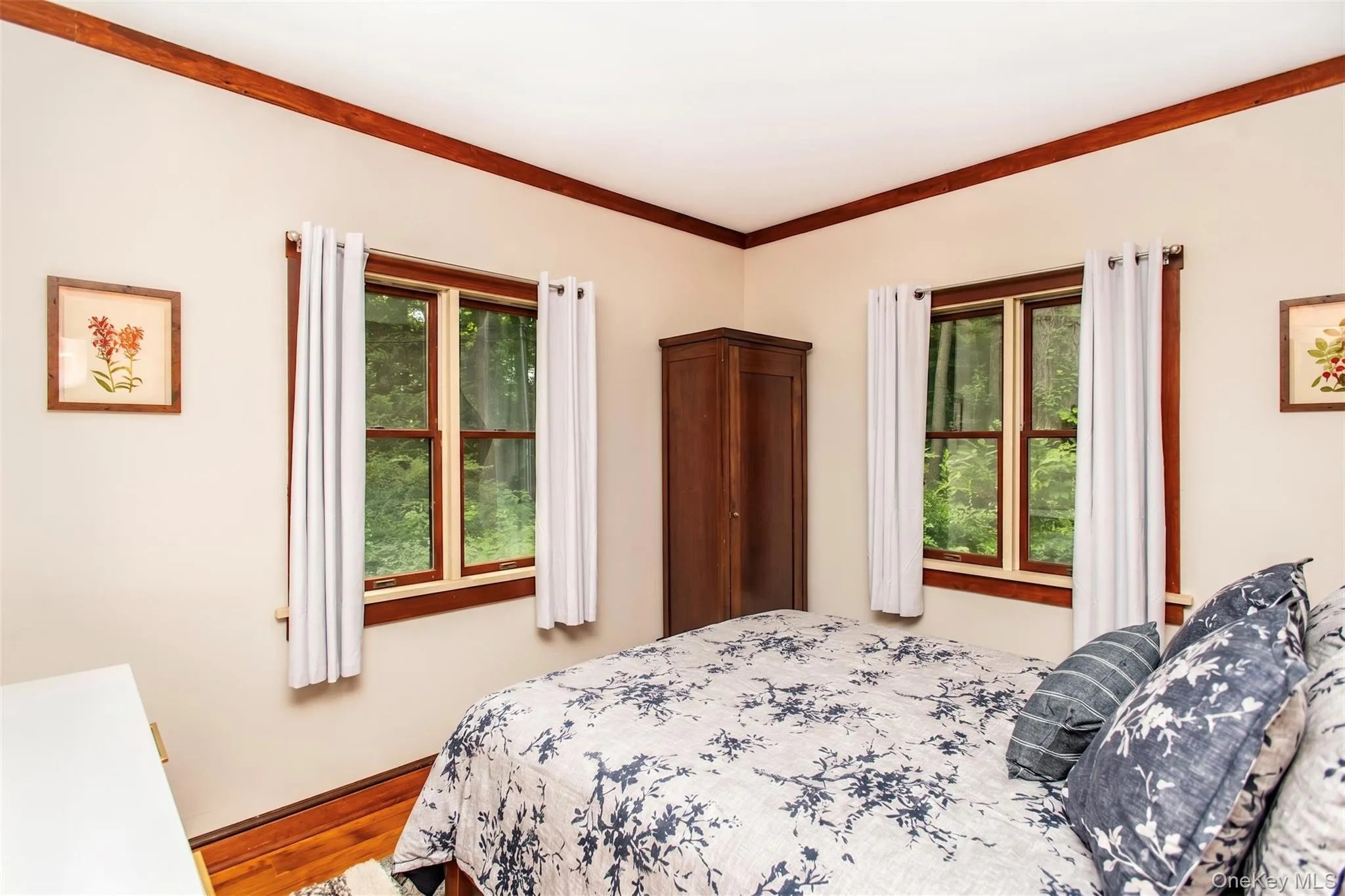 Bedroom with a brand-new queen bed, fresh linens, and a storage closet, offering a comfortable and restful retreat with convenient storage. Bedroom with a brand-new queen bed, fresh linens, and a storage closet, offering a comfortable and restful retreat with convenient storage.
