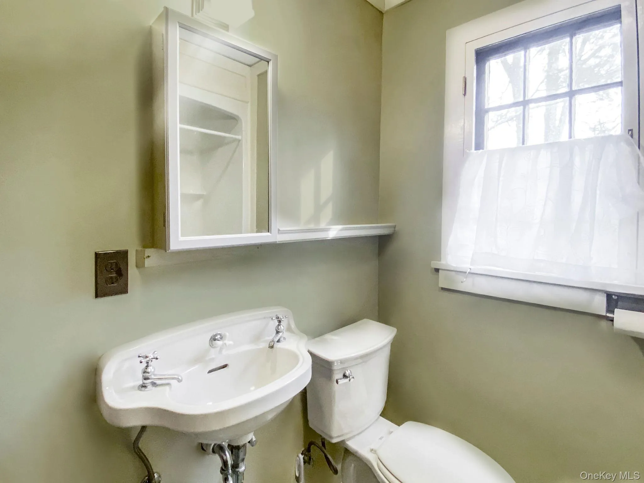 Bathroom with shower, washer and dryer. Bathroom with shower, washer and dryer.