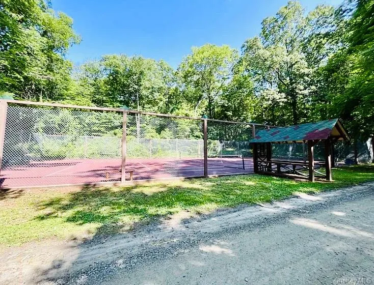 Tennis court for use by the community. Tennis court for use by the community.