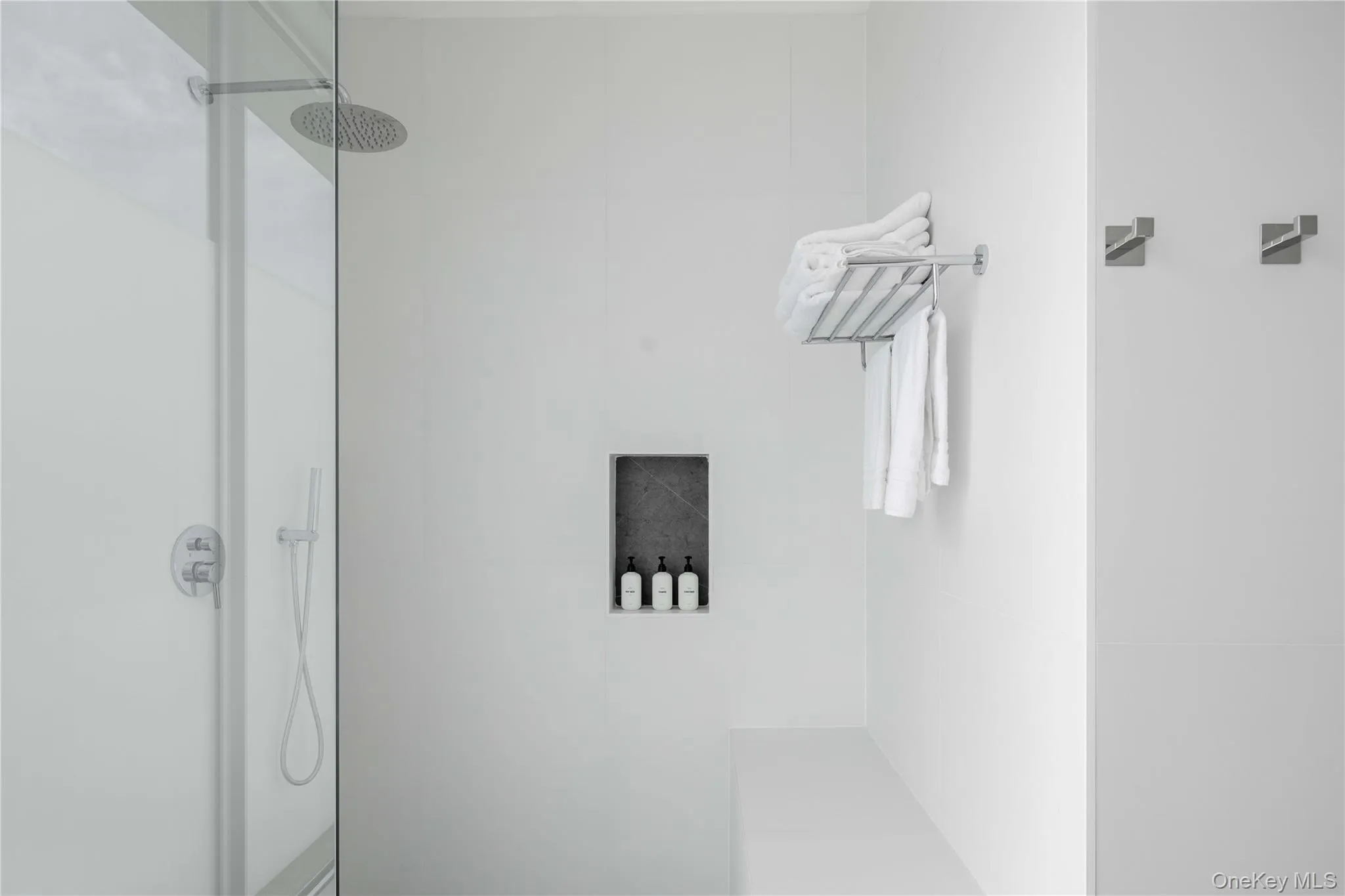 Bathroom with tiled shower Bathroom with tiled shower