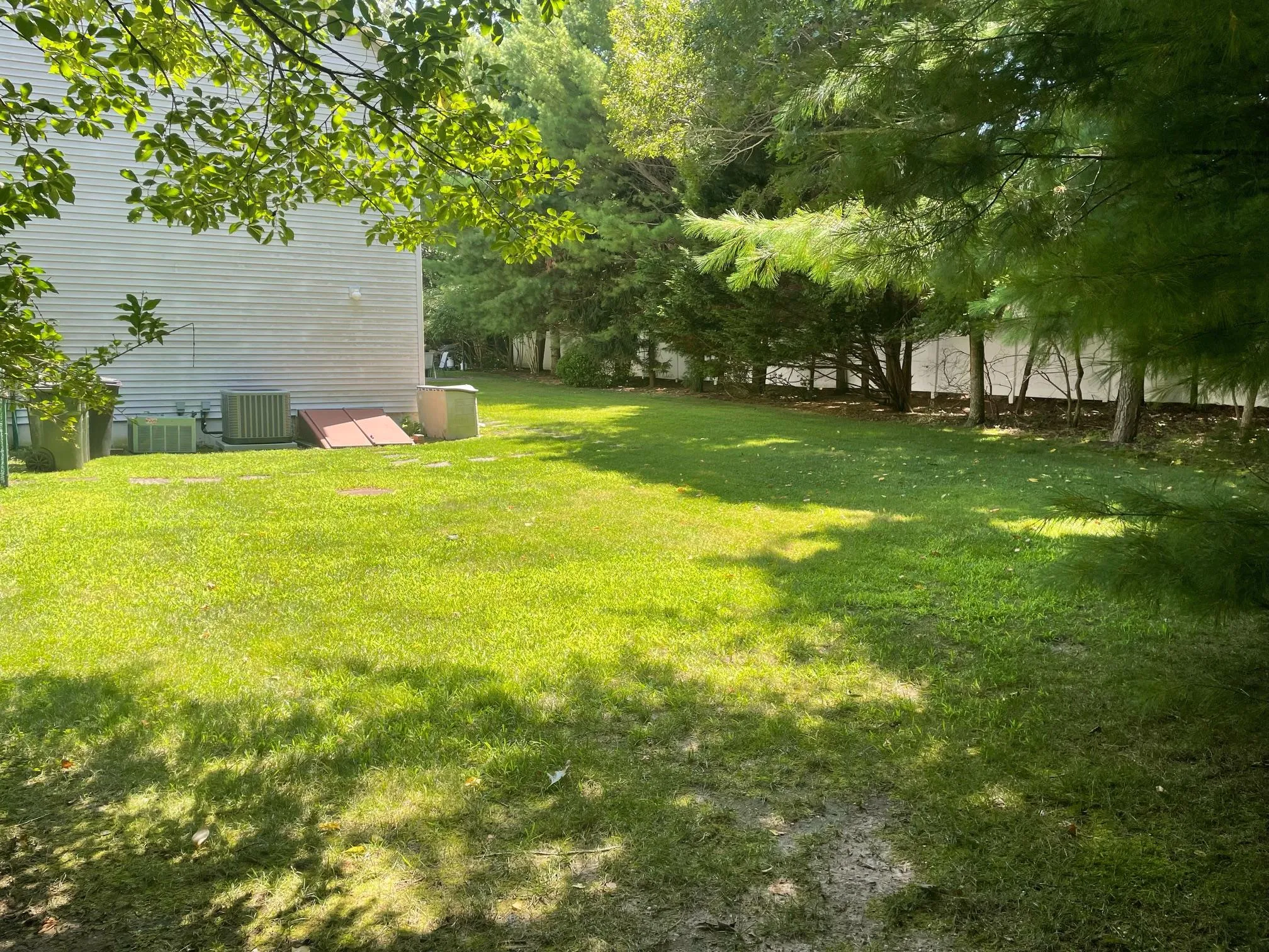 View of yard with cooling unit View of yard with cooling unit