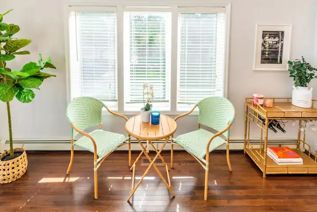 Sitting room featuring dark hardwood / wood-style floors and plenty of natural light Sitting room featuring dark hardwood / wood-style floors and plenty of natural light