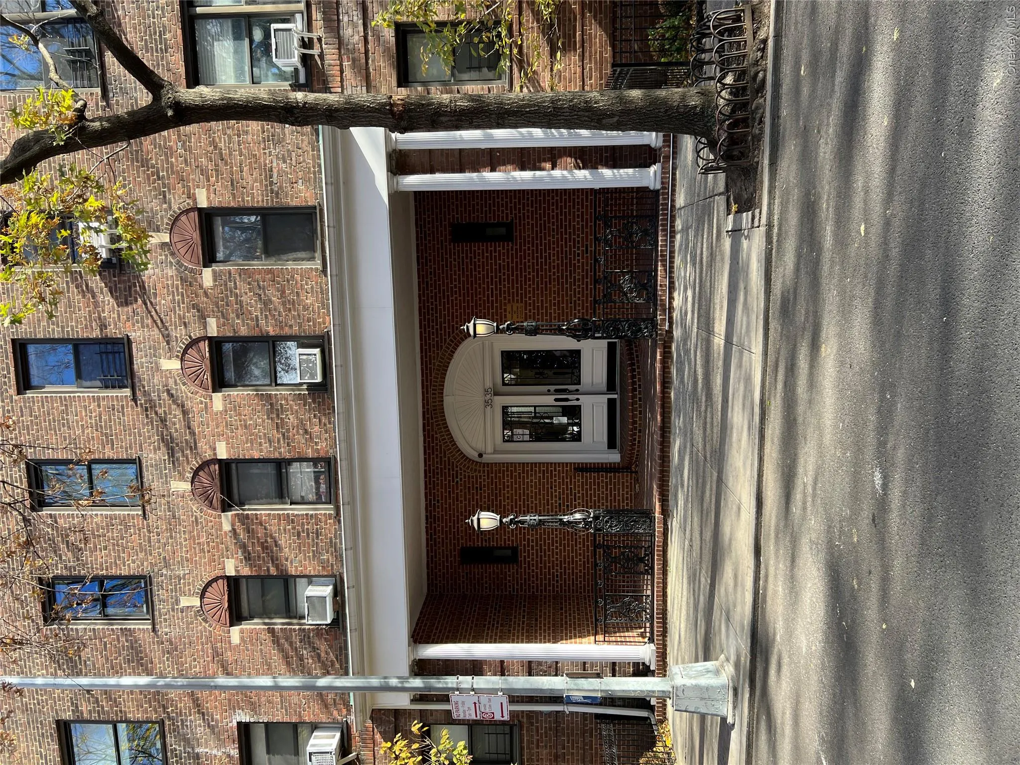 View of building exterior featuring cooling unit View of building exterior featuring cooling unit