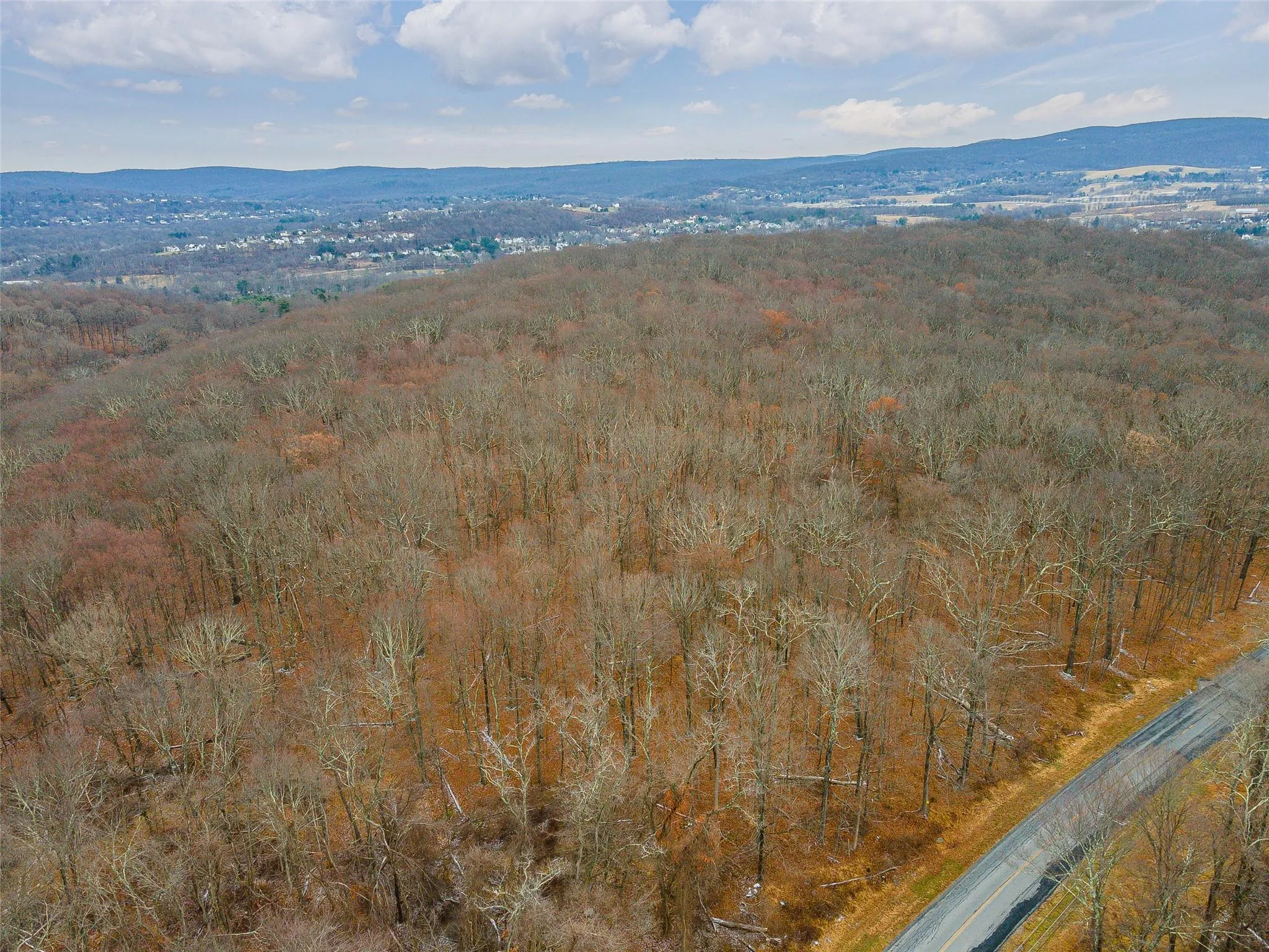 Birds eye view of property with a mountain view Birds eye view of property with a mountain view