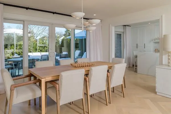 Dining space with light parquet floors Dining space with light parquet floors