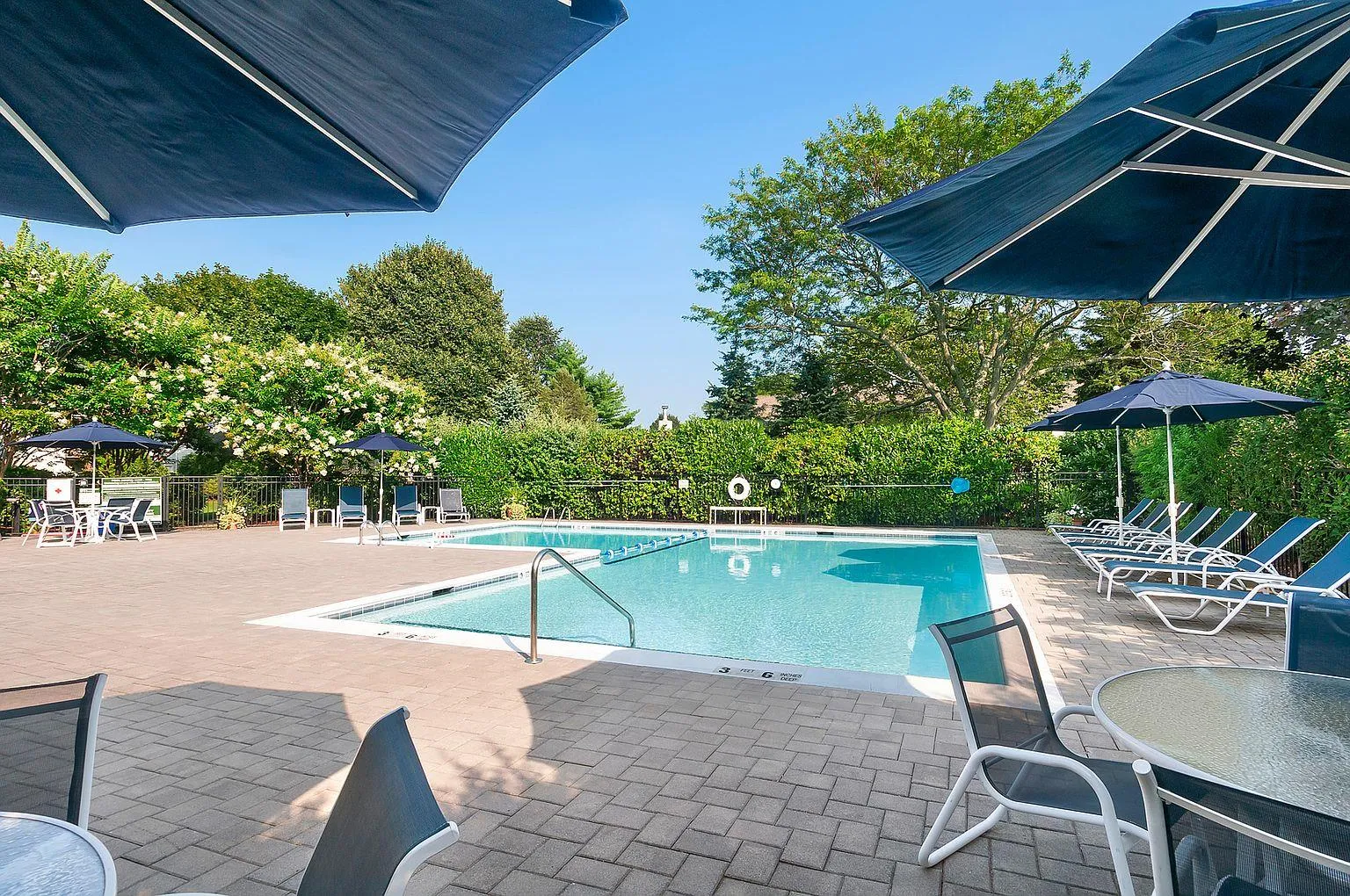 View of swimming pool featuring a patio area View of swimming pool featuring a patio area