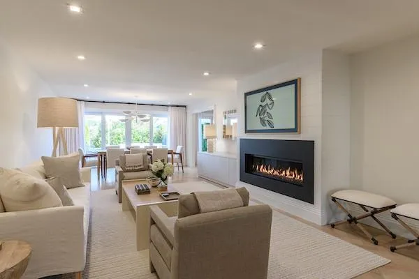 Living room with a notable chandelier Living room with a notable chandelier