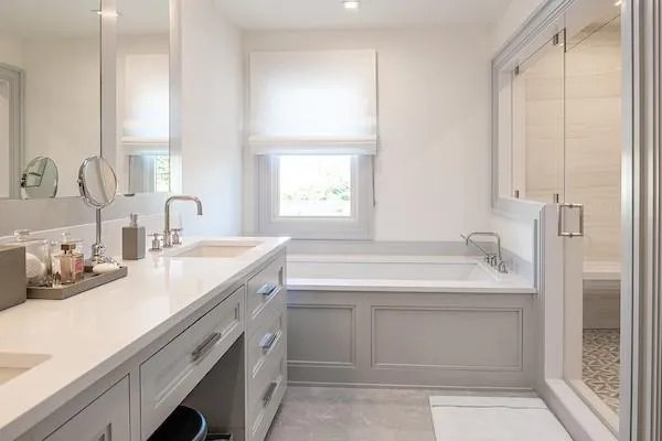 Bathroom featuring vanity and plus walk in shower Bathroom featuring vanity and plus walk in shower