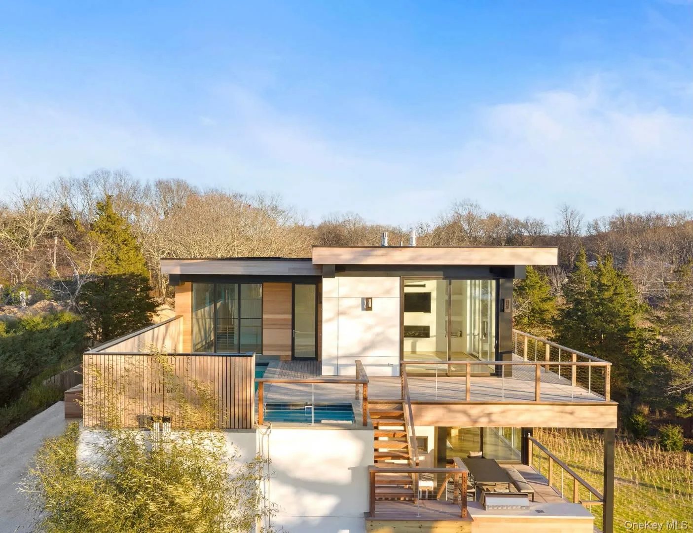 View of front of home featuring a wooden deck View of front of home featuring a wooden deck