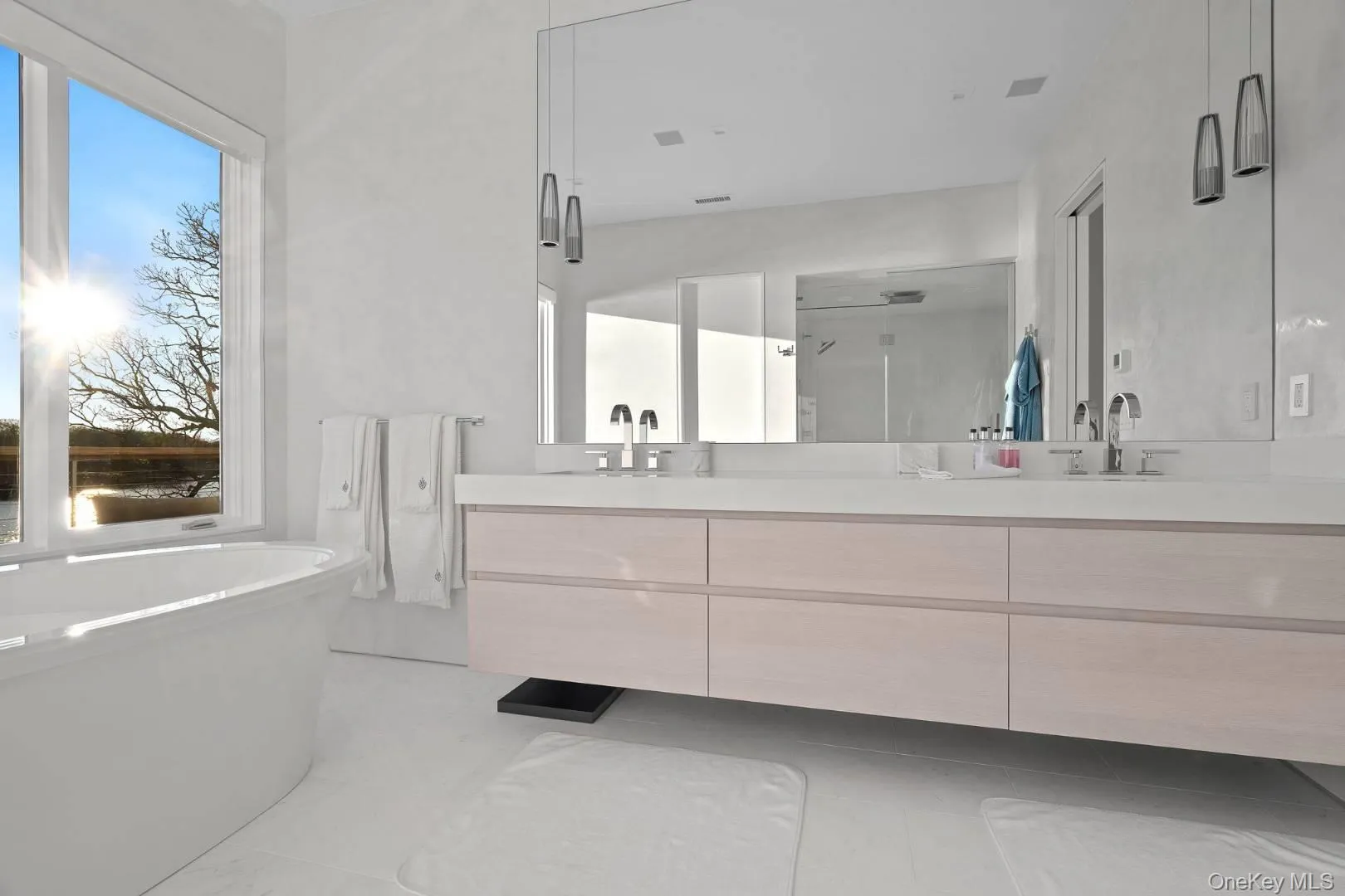 Bathroom featuring plus walk in shower and vanity Bathroom featuring plus walk in shower and vanity