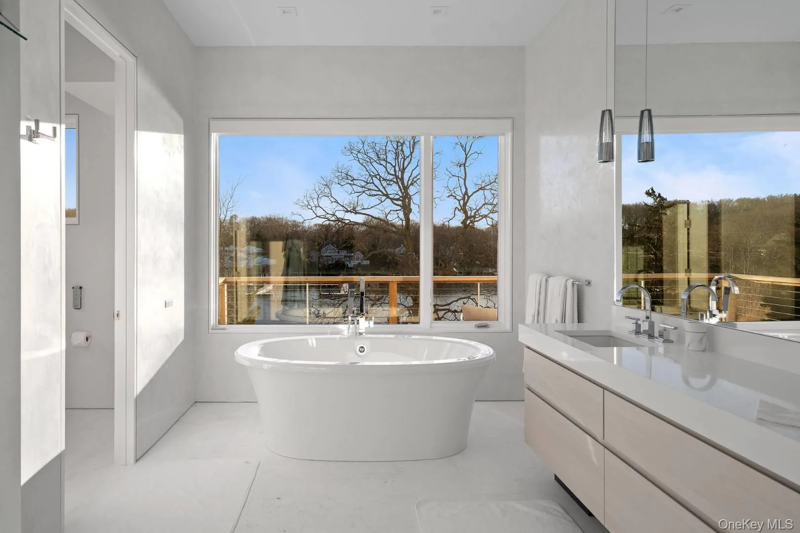 Bathroom with a bathing tub and vanity Bathroom with a bathing tub and vanity