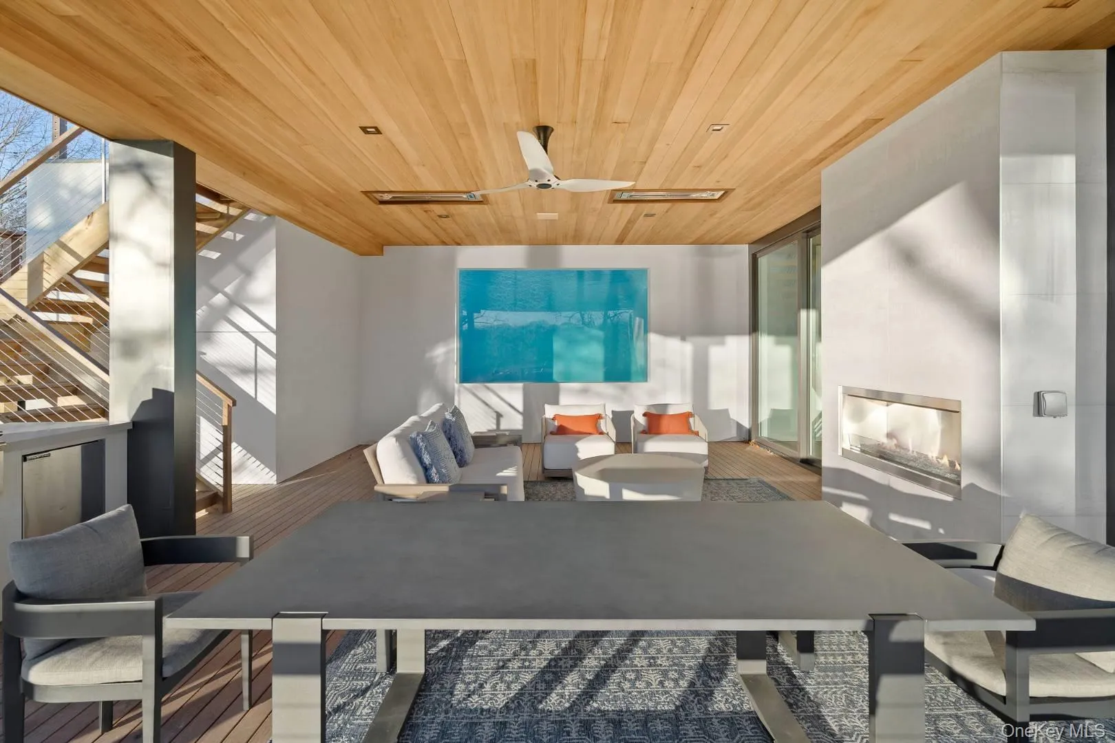 Office featuring floor to ceiling windows, ceiling fan, and wood ceiling Office featuring floor to ceiling windows, ceiling fan, and wood ceiling