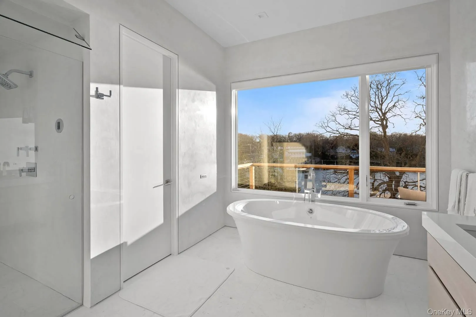 Bathroom with vanity and a tub Bathroom with vanity and a tub