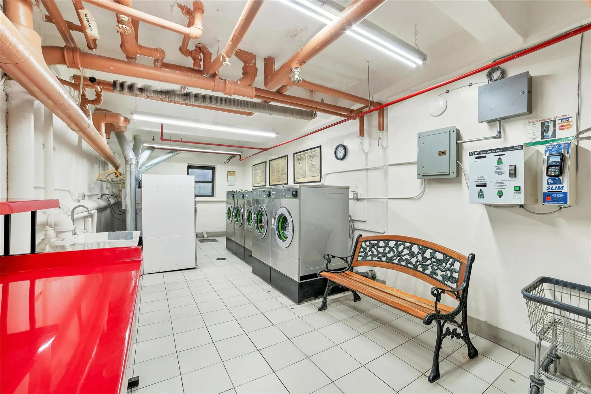 Laundry area featuring independent washer and dryer and electric panel Laundry area featuring independent washer and dryer and electric panel