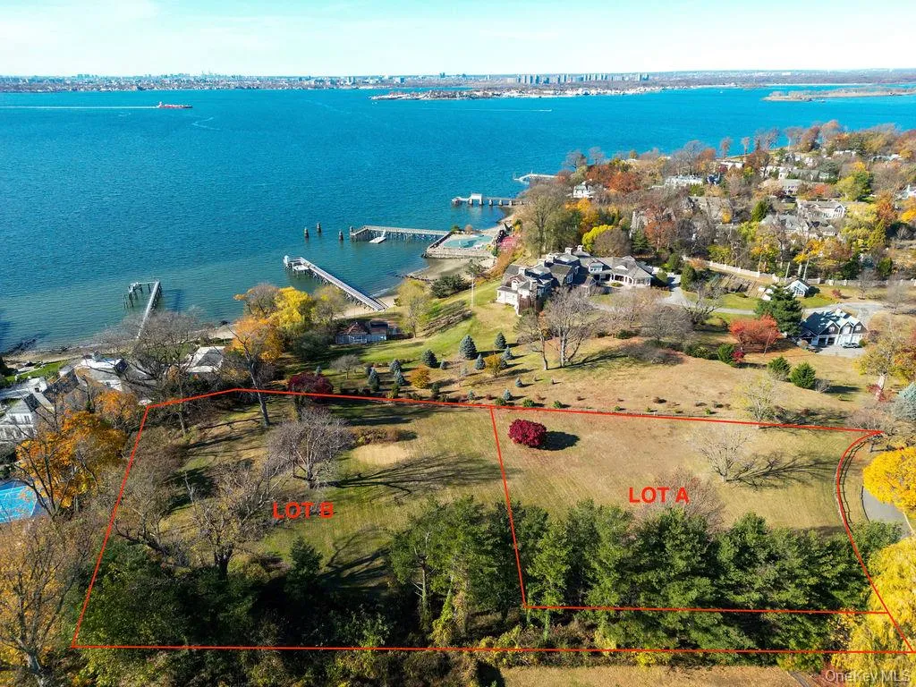Aerial view featuring a water view Aerial view featuring a water view