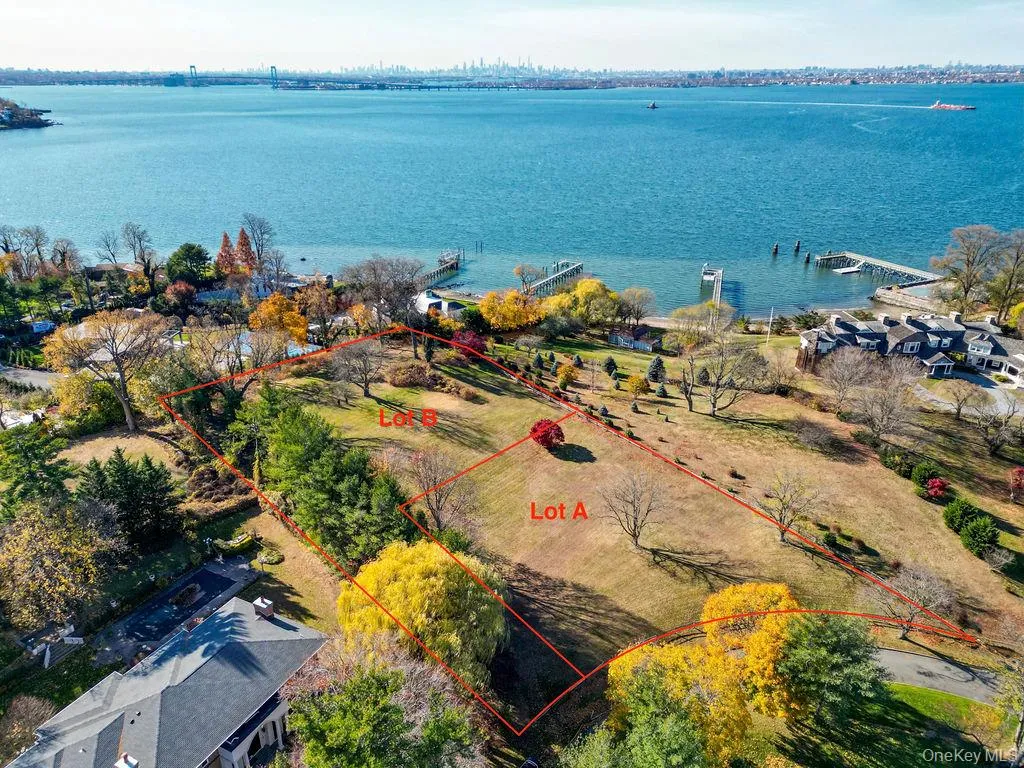 Aerial view featuring a water view Aerial view featuring a water view