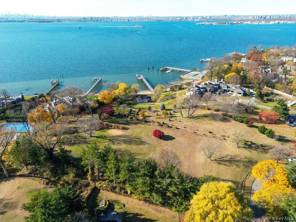 Aerial view featuring a water view Aerial view featuring a water view