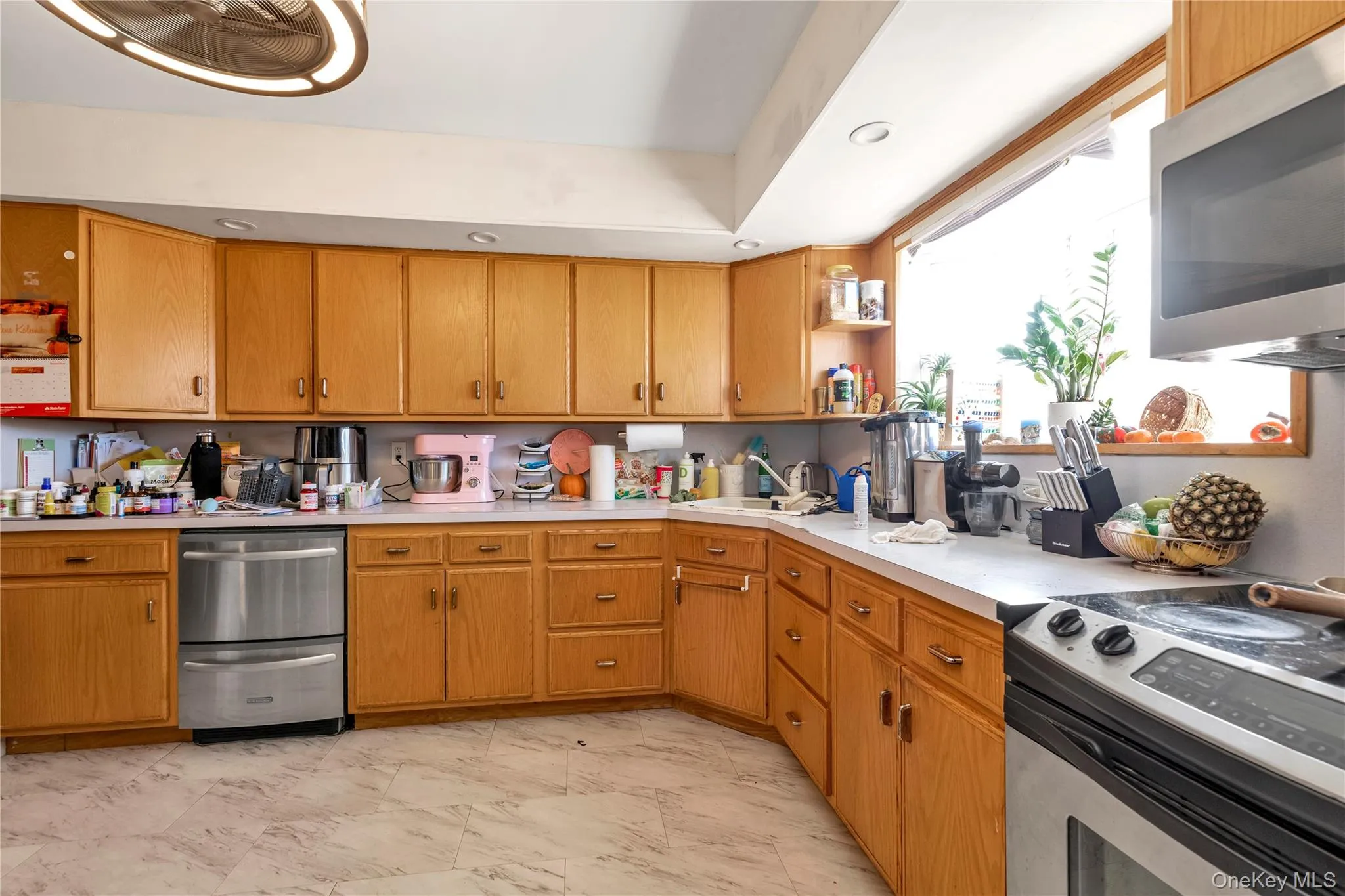 Kitchen featuring appliances with stainless steel finishes and sink Kitchen featuring appliances with stainless steel finishes and sink