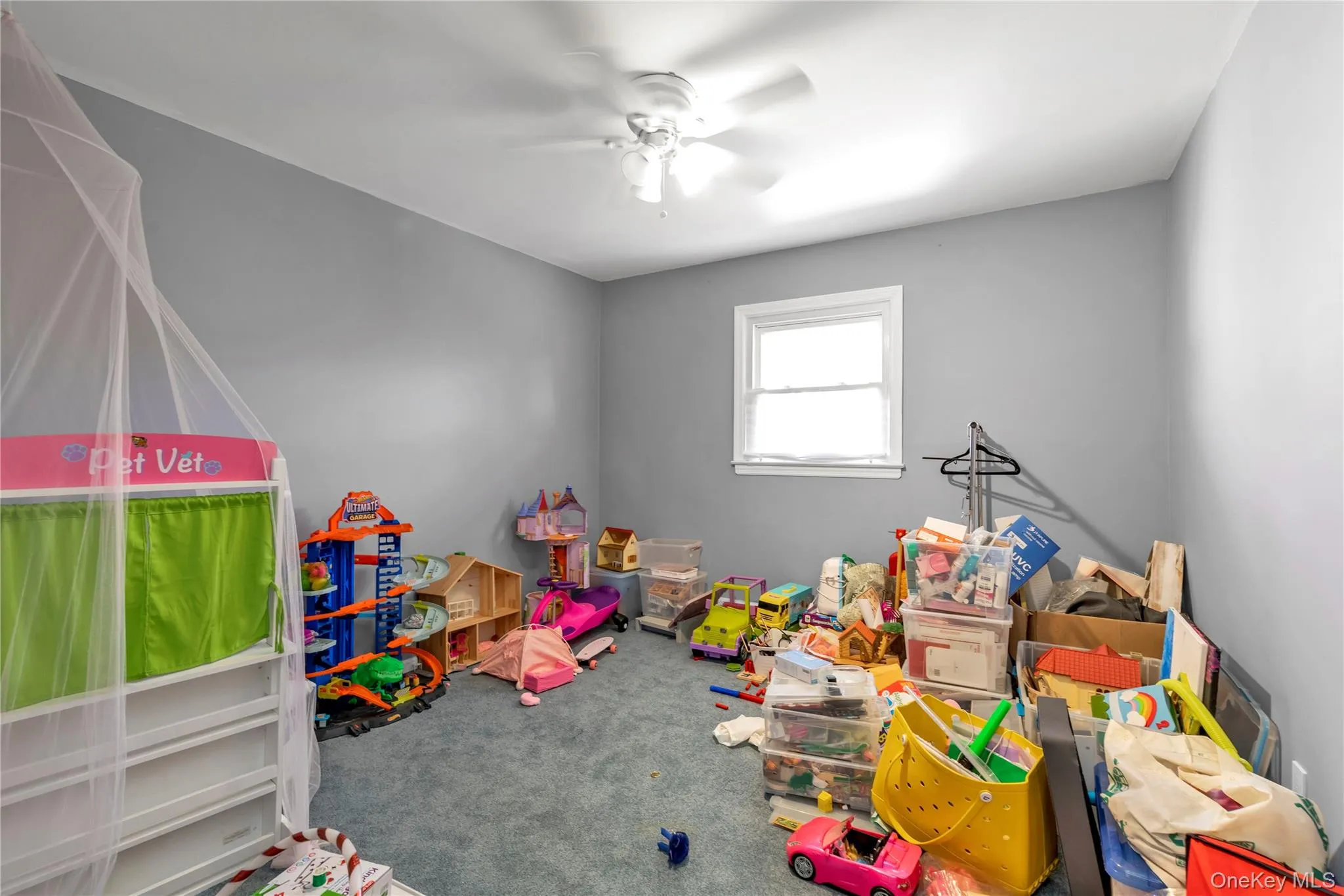 Playroom featuring ceiling fan and carpet Playroom featuring ceiling fan and carpet