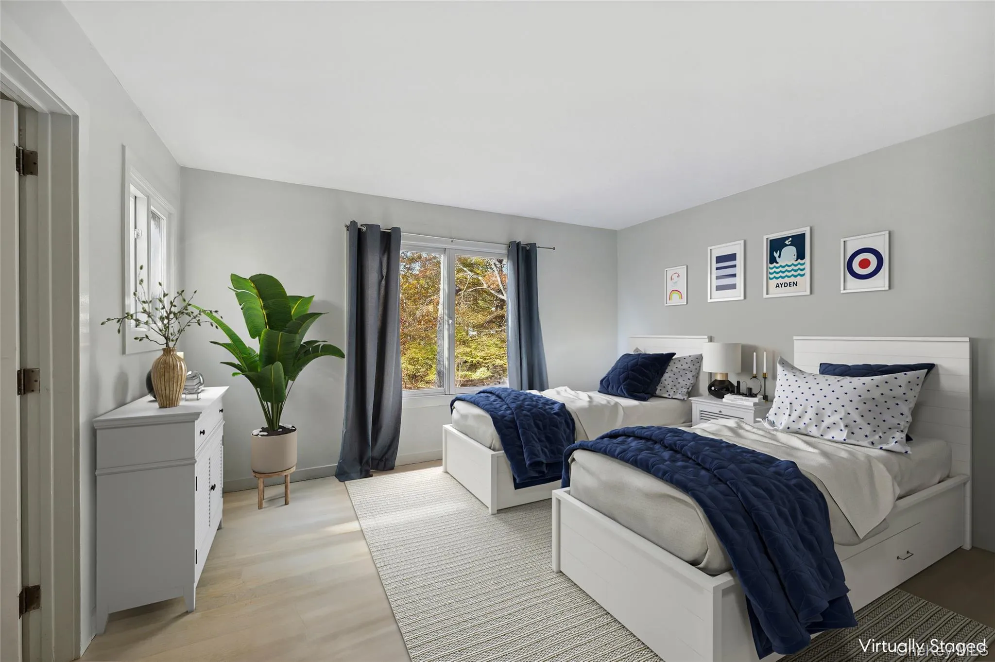 Bedroom featuring light hardwood / wood-style flooring Bedroom featuring light hardwood / wood-style flooring