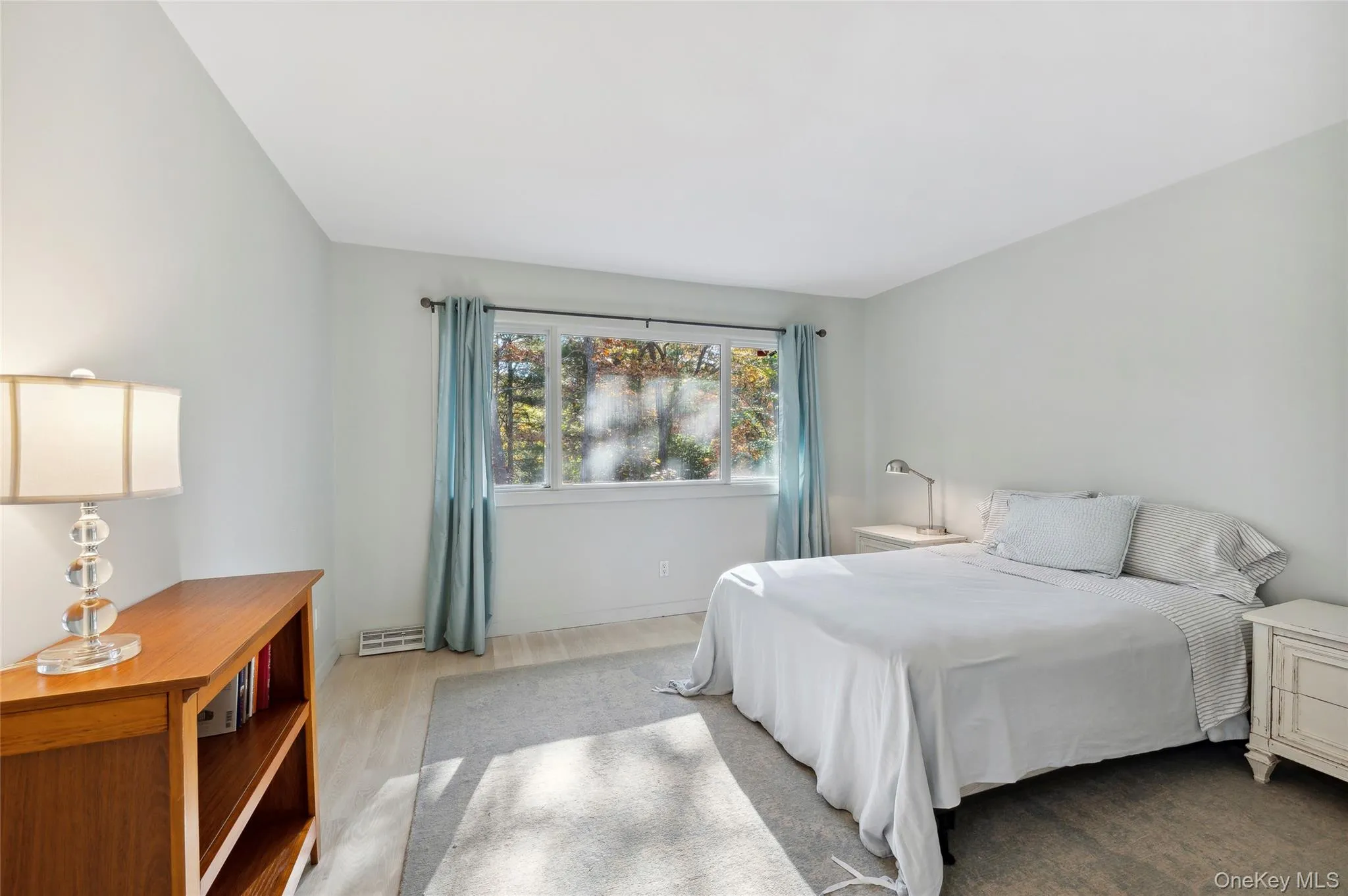 Bedroom featuring light wood-type flooring Bedroom featuring light wood-type flooring