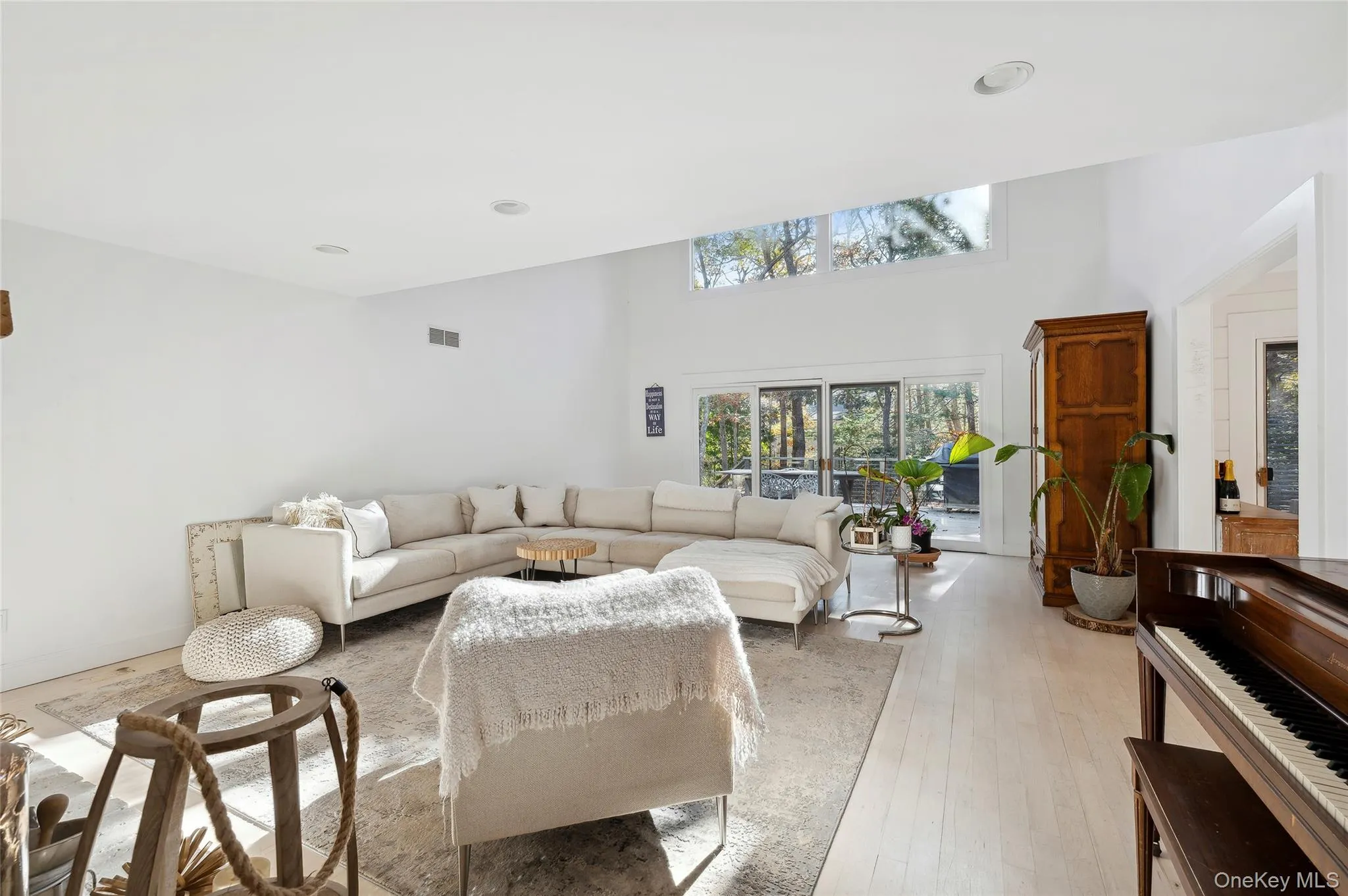 Living room with light hardwood / wood-style floors Living room with light hardwood / wood-style floors