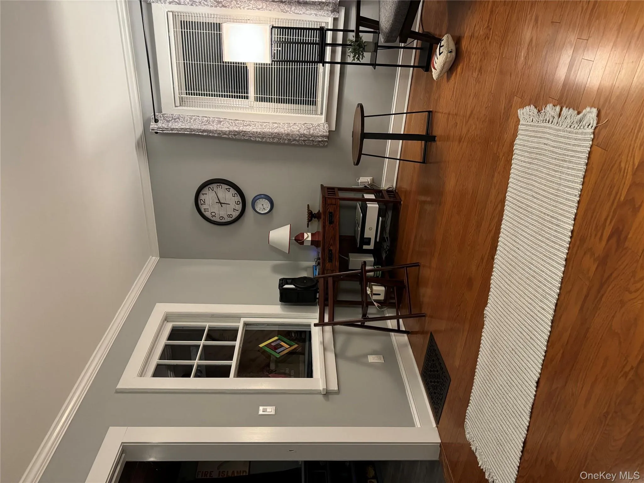 Office space featuring ornamental molding and wood finished floors Office space featuring ornamental molding and wood finished floors