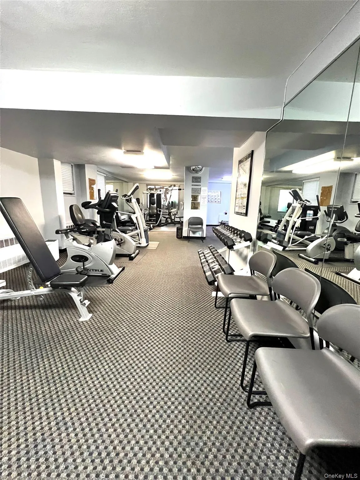 Workout area with carpet floors Workout area with carpet floors