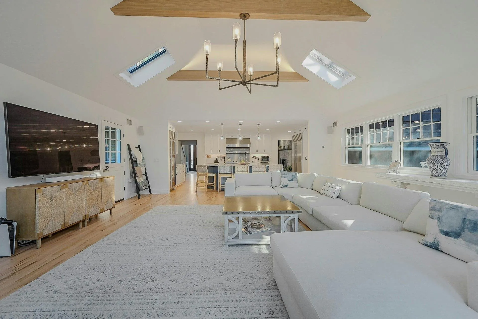 Living room with a skylight, high vaulted ceiling Living room with a skylight, high vaulted ceiling