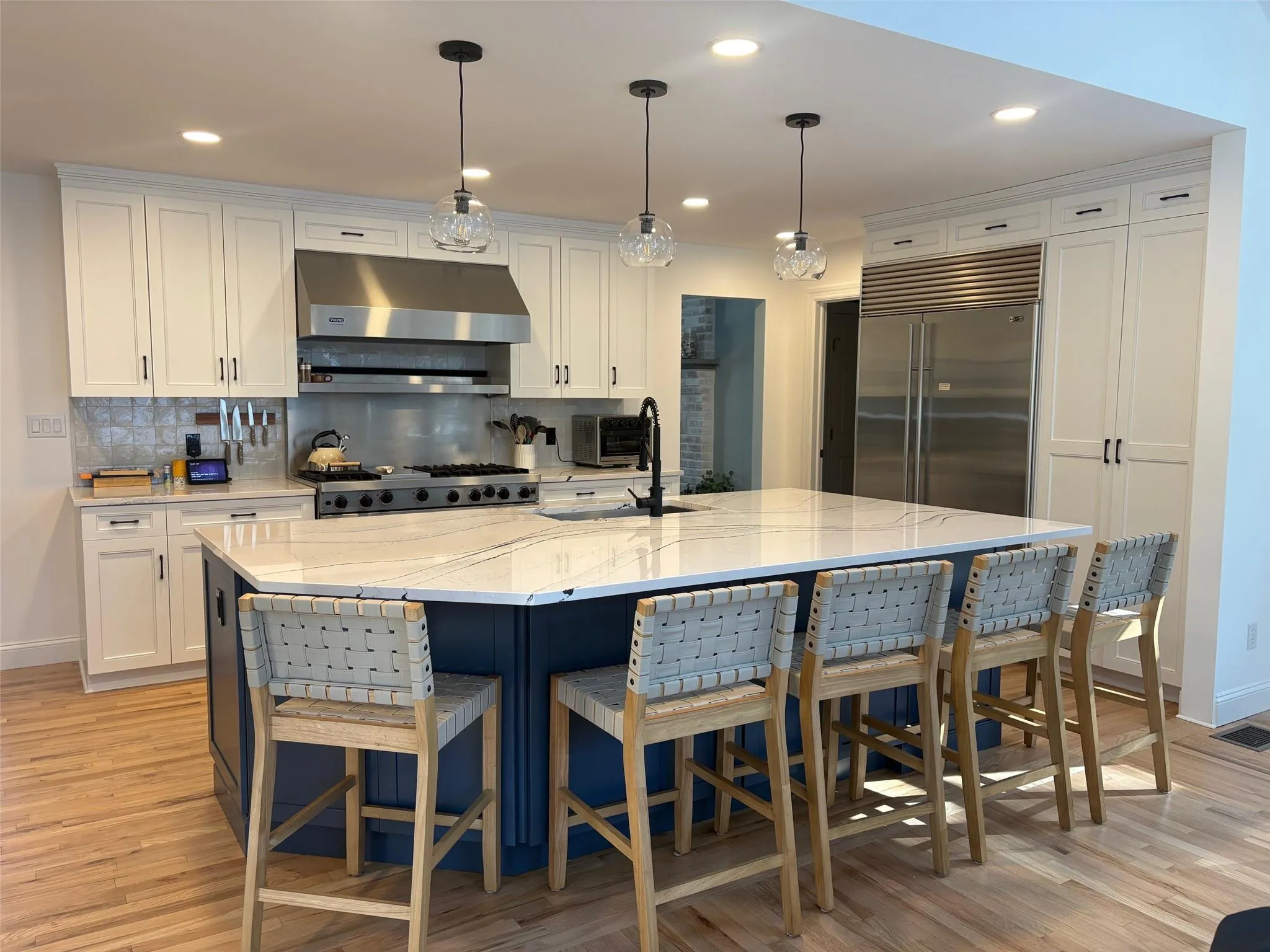 Kitchen featuring a spacious island and premium appliances Kitchen featuring a spacious island and premium appliances