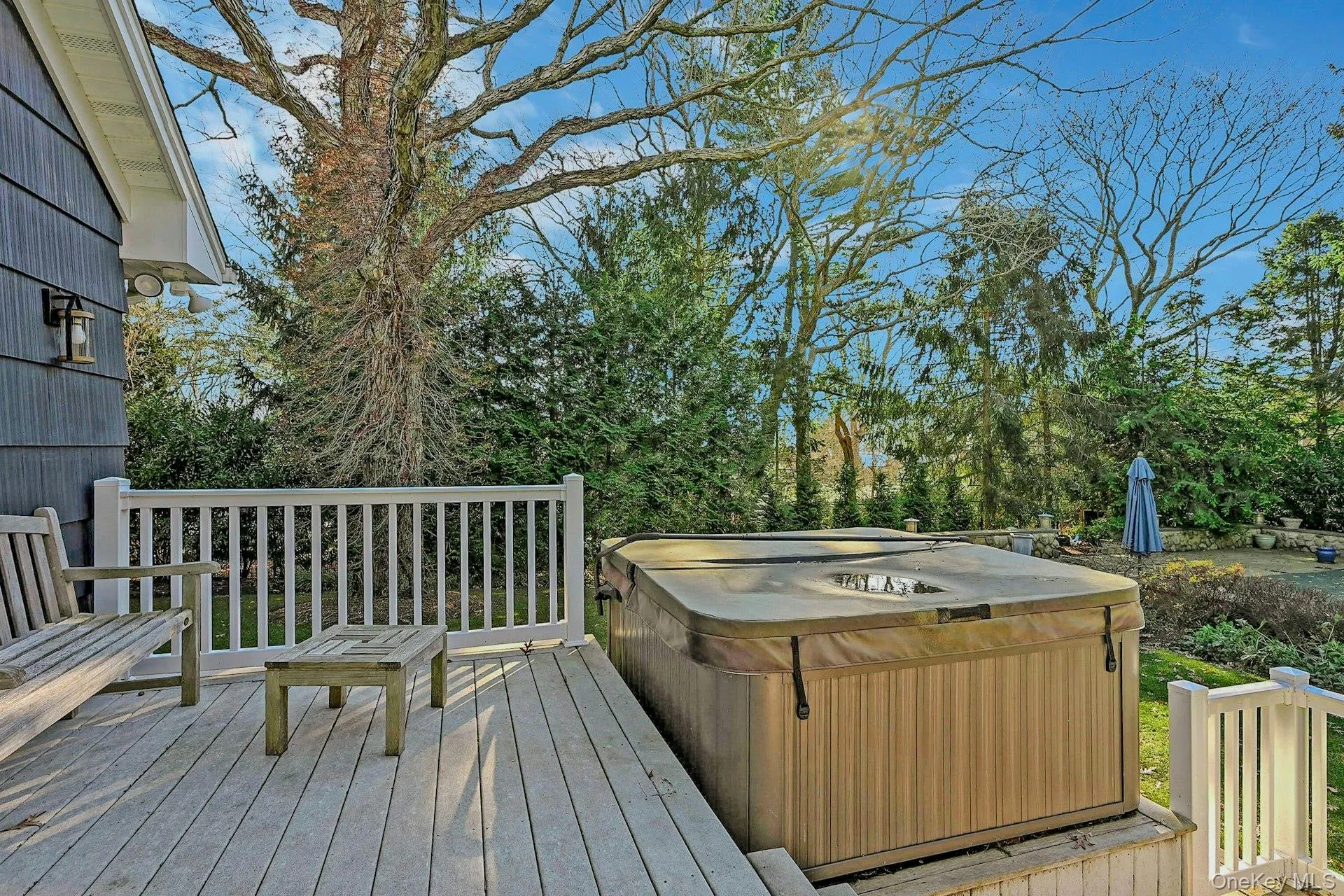 Wooden terrace with a hot tub Wooden terrace with a hot tub