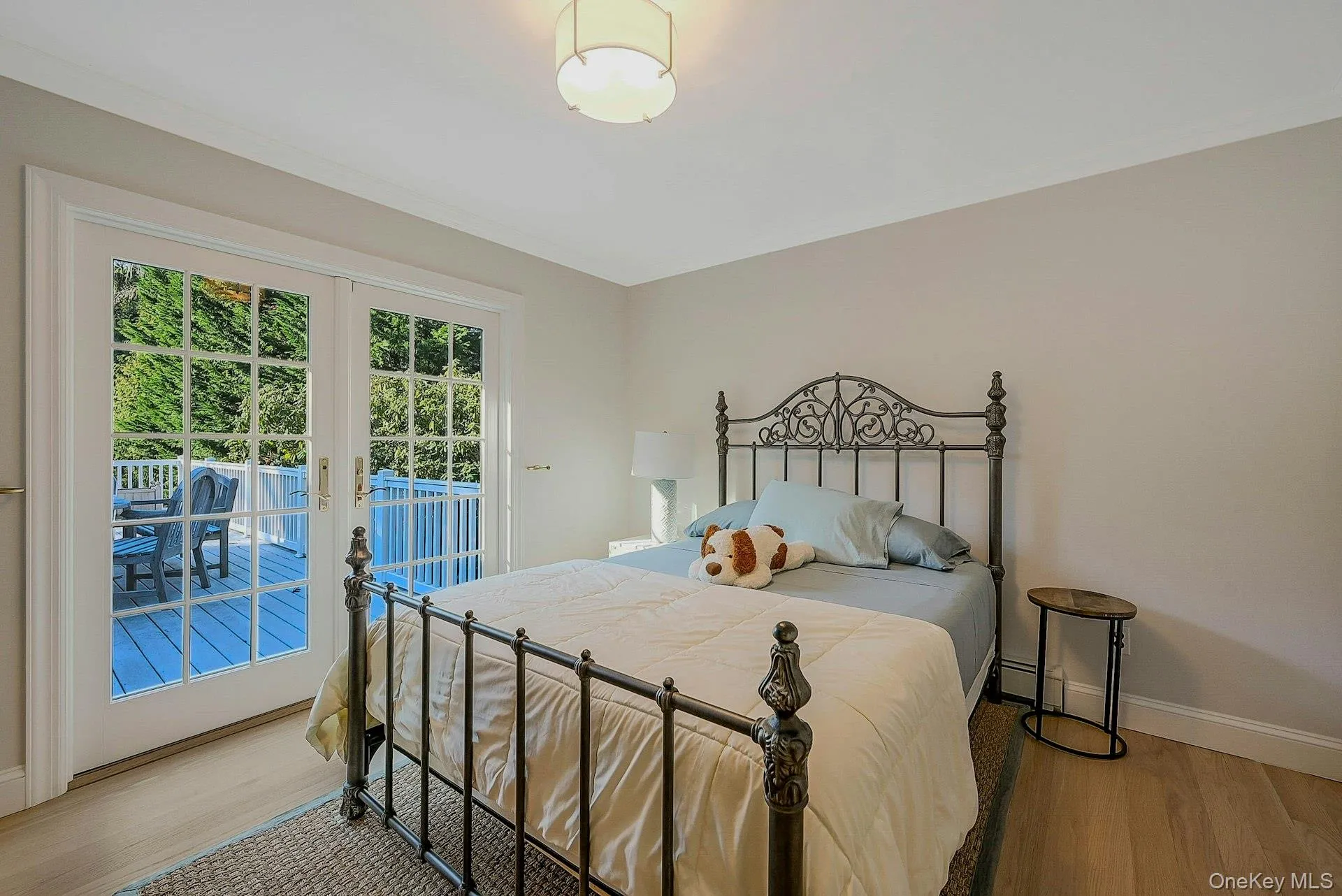 First floor bedroom adjacent to the deck First floor bedroom adjacent to the deck