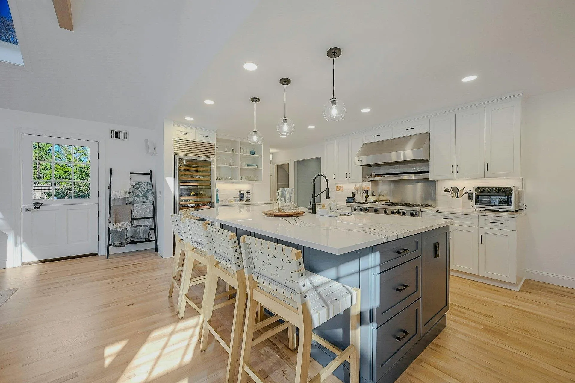 Kitchen featuring a spacious island and premium appliances Kitchen featuring a spacious island and premium appliances