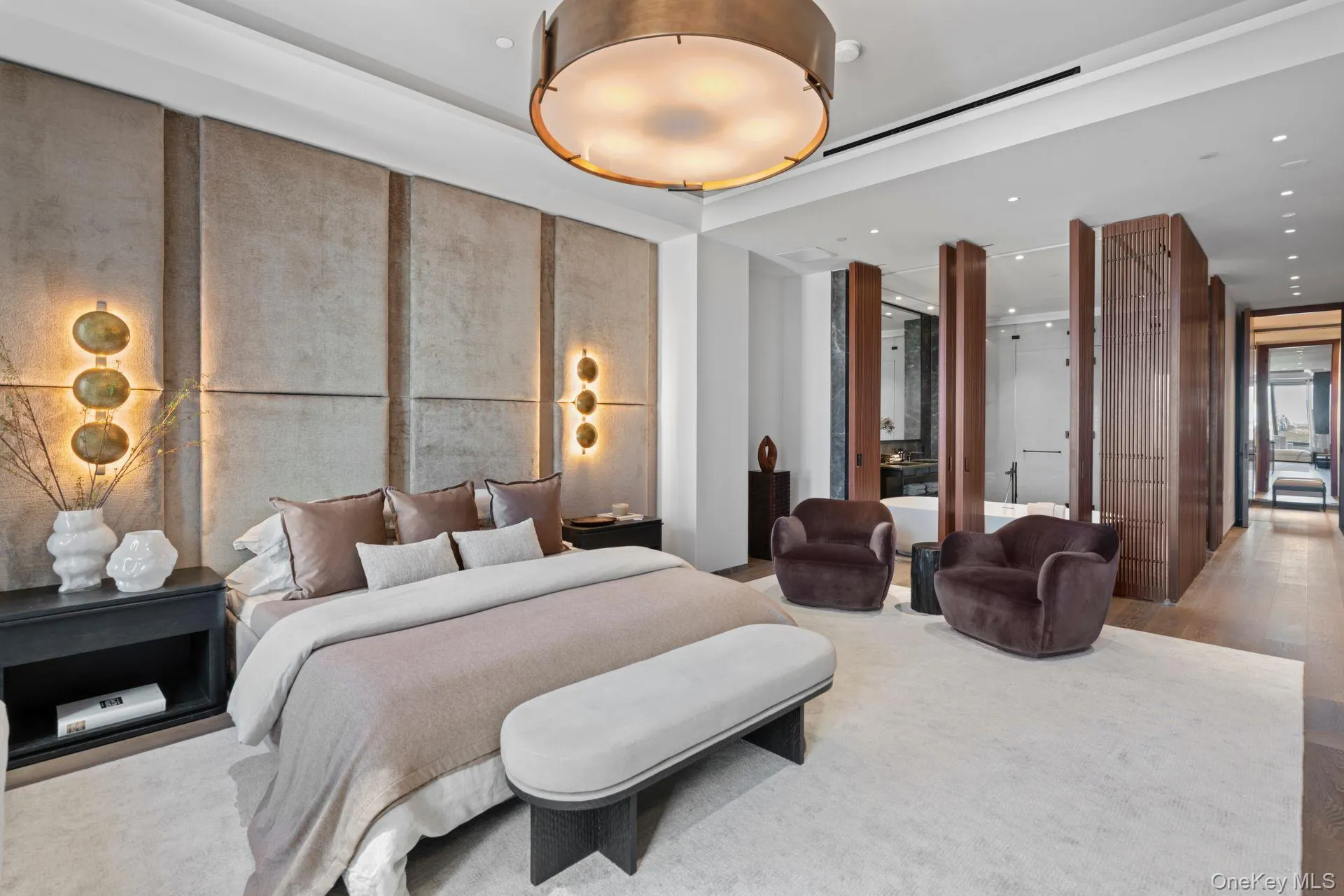 Bedroom featuring wood finished floors and recessed lighting Bedroom featuring wood finished floors and recessed lighting