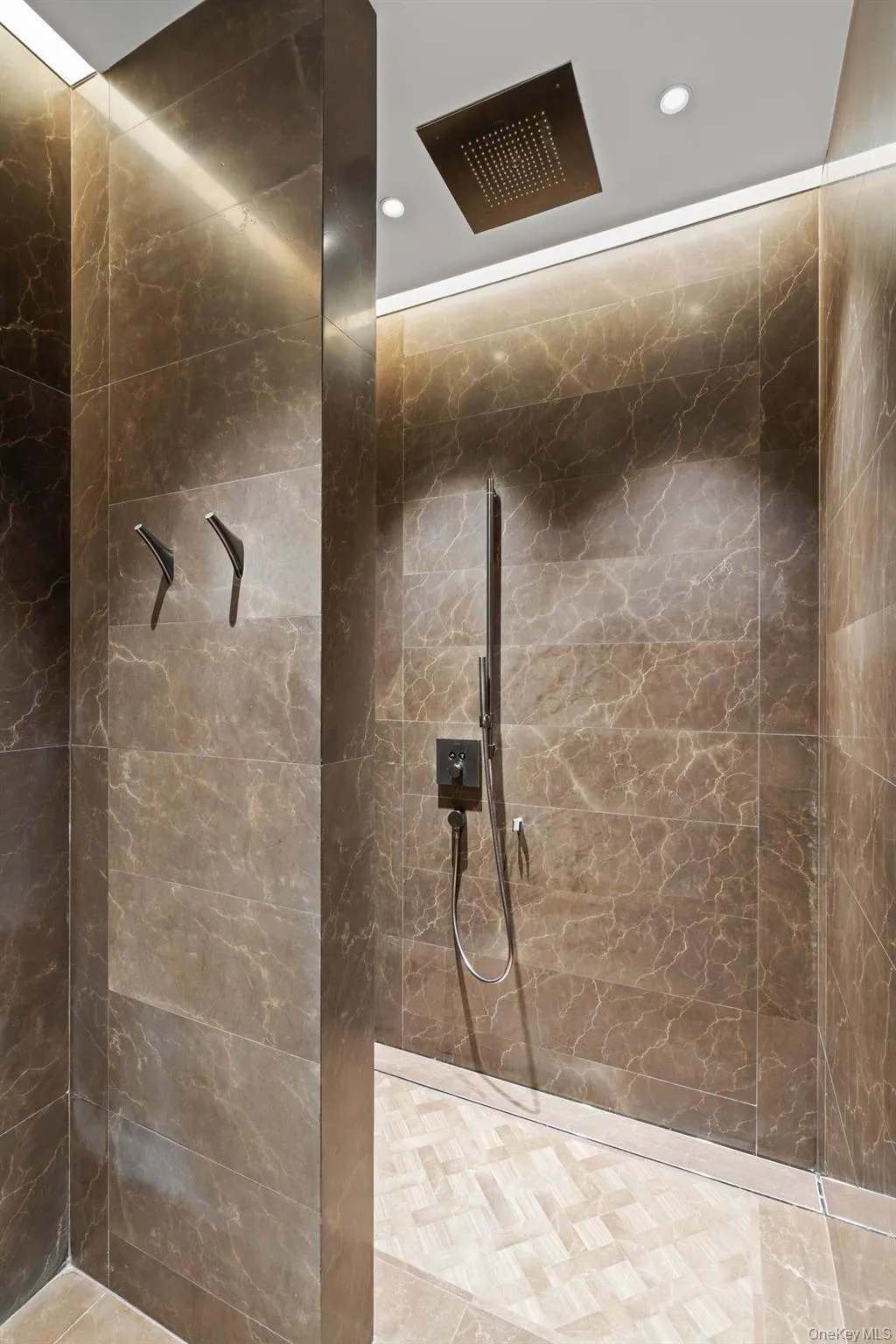 Full bathroom featuring recessed lighting and walk in shower Full bathroom featuring recessed lighting and walk in shower