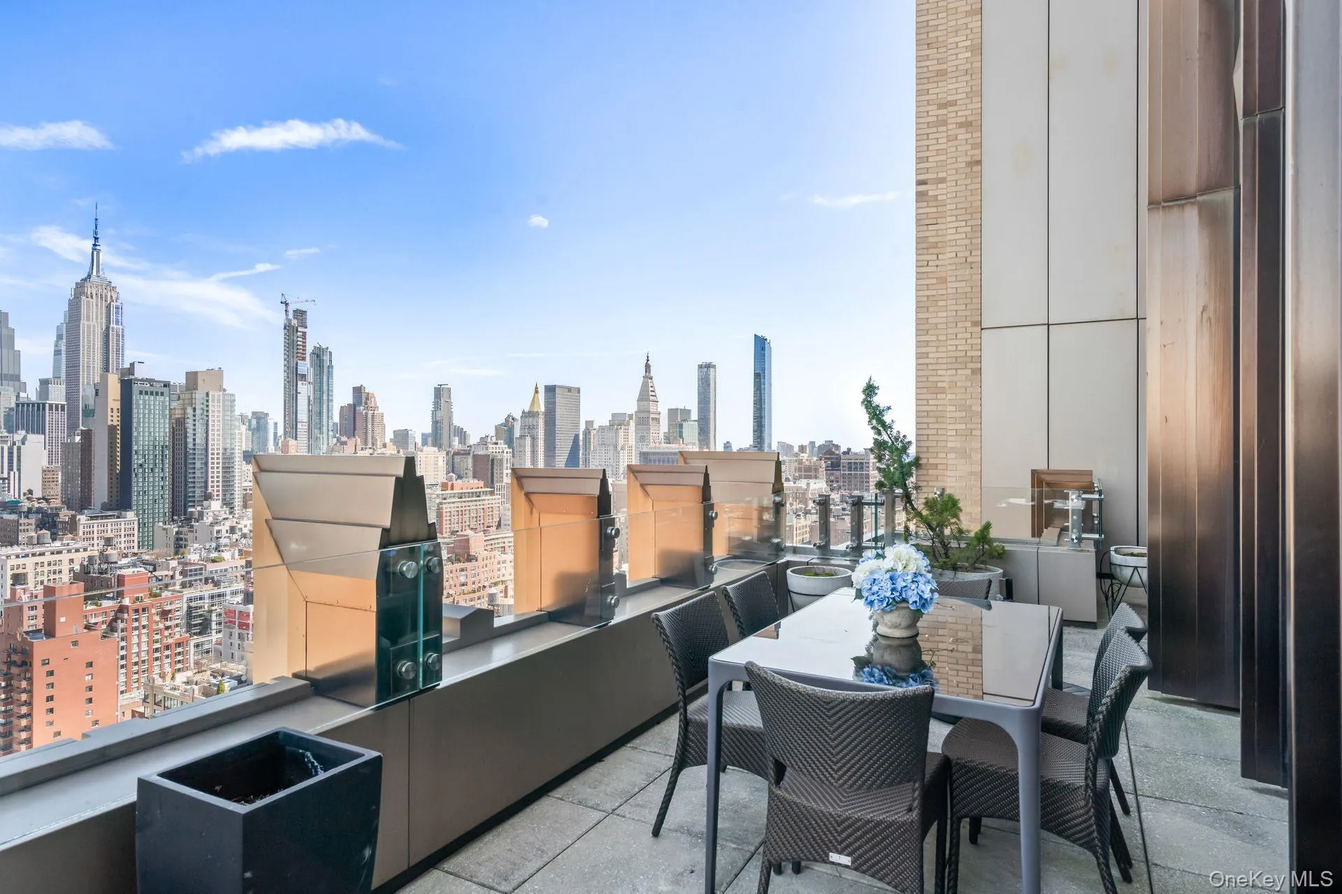 View of patio / terrace featuring a city view and a balcony View of patio / terrace featuring a city view and a balcony