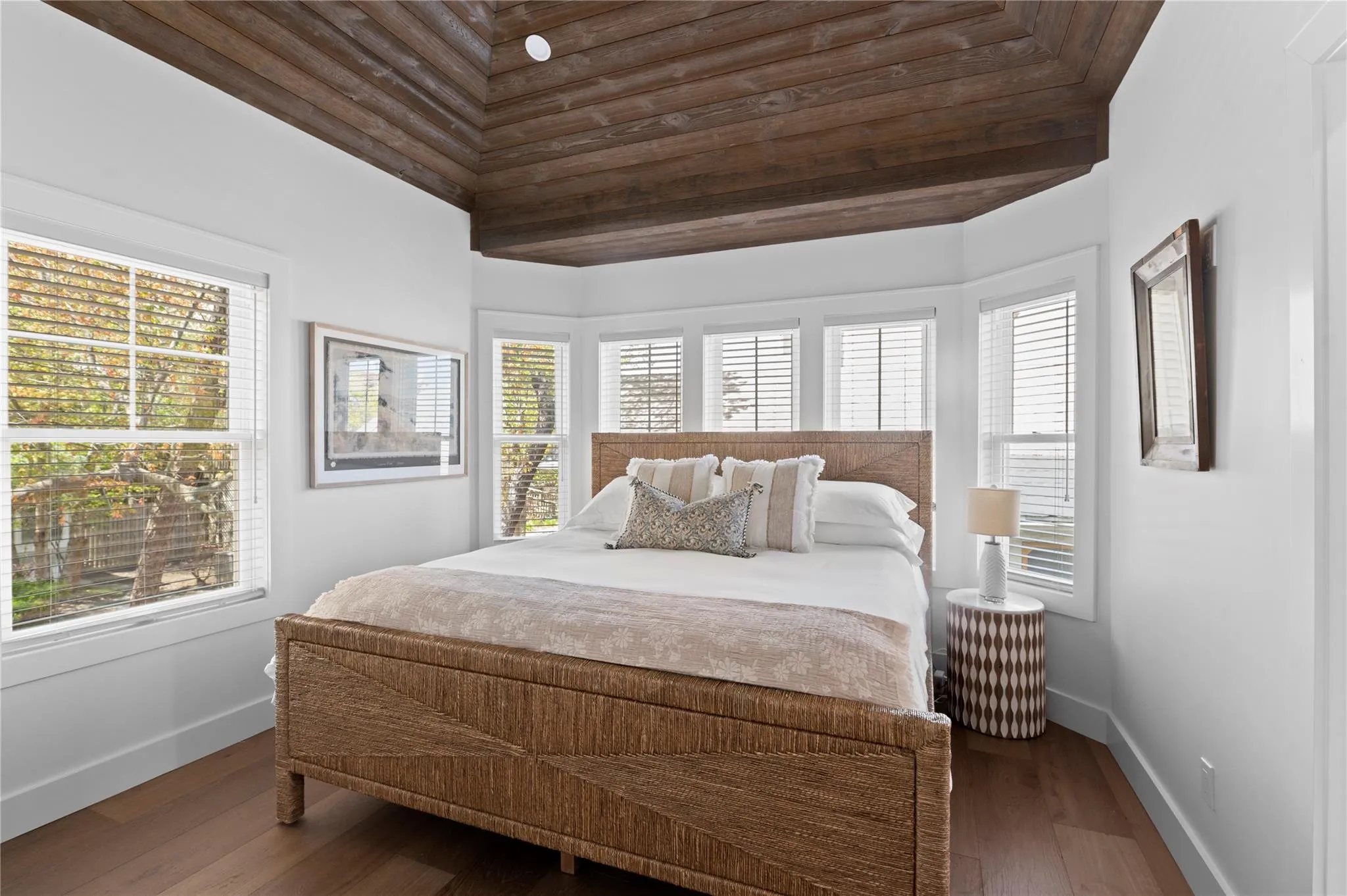 Bedroom with baseboards and wood finished floors Bedroom with baseboards and wood finished floors