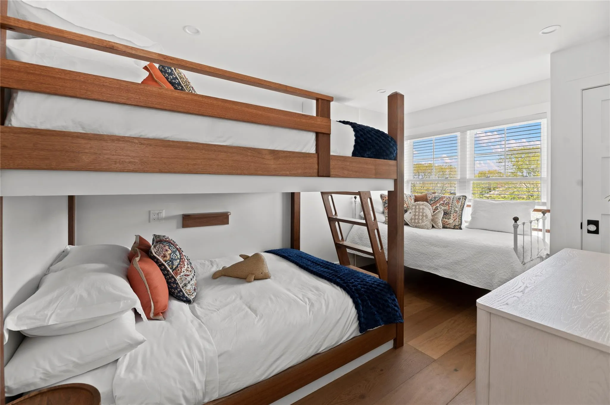 Bedroom with wood finished floors and recessed lighting Bedroom with wood finished floors and recessed lighting