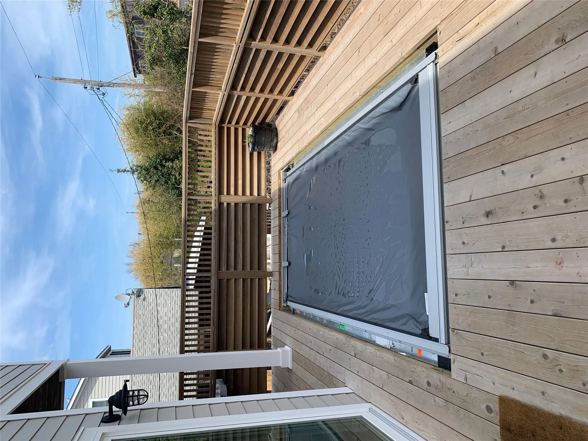 View of swimming pool with a wooden deck View of swimming pool with a wooden deck