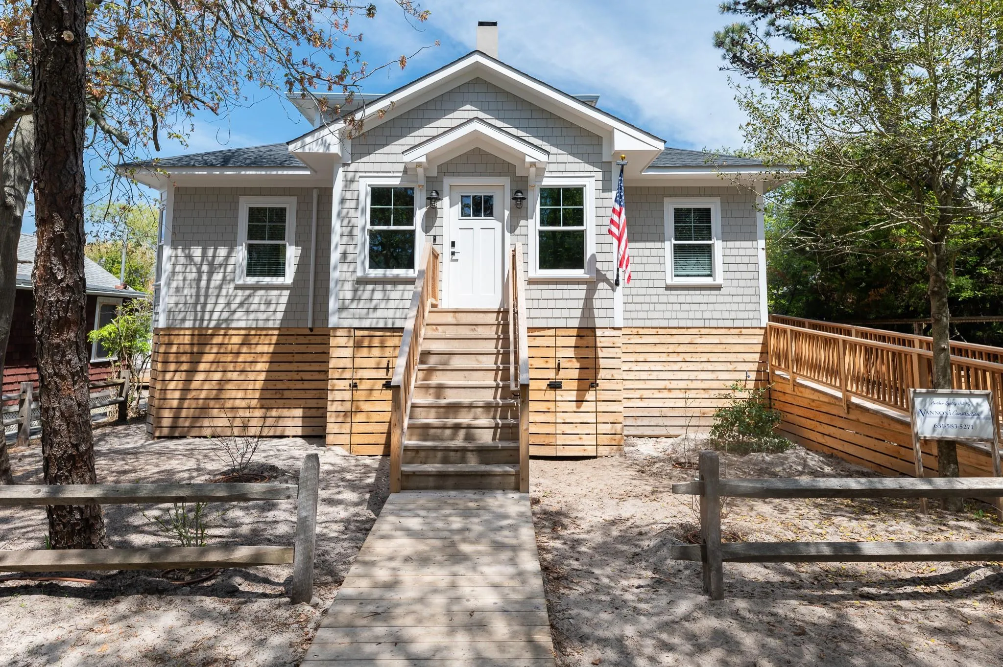 Bungalow-style home with entry steps Bungalow-style home with entry steps