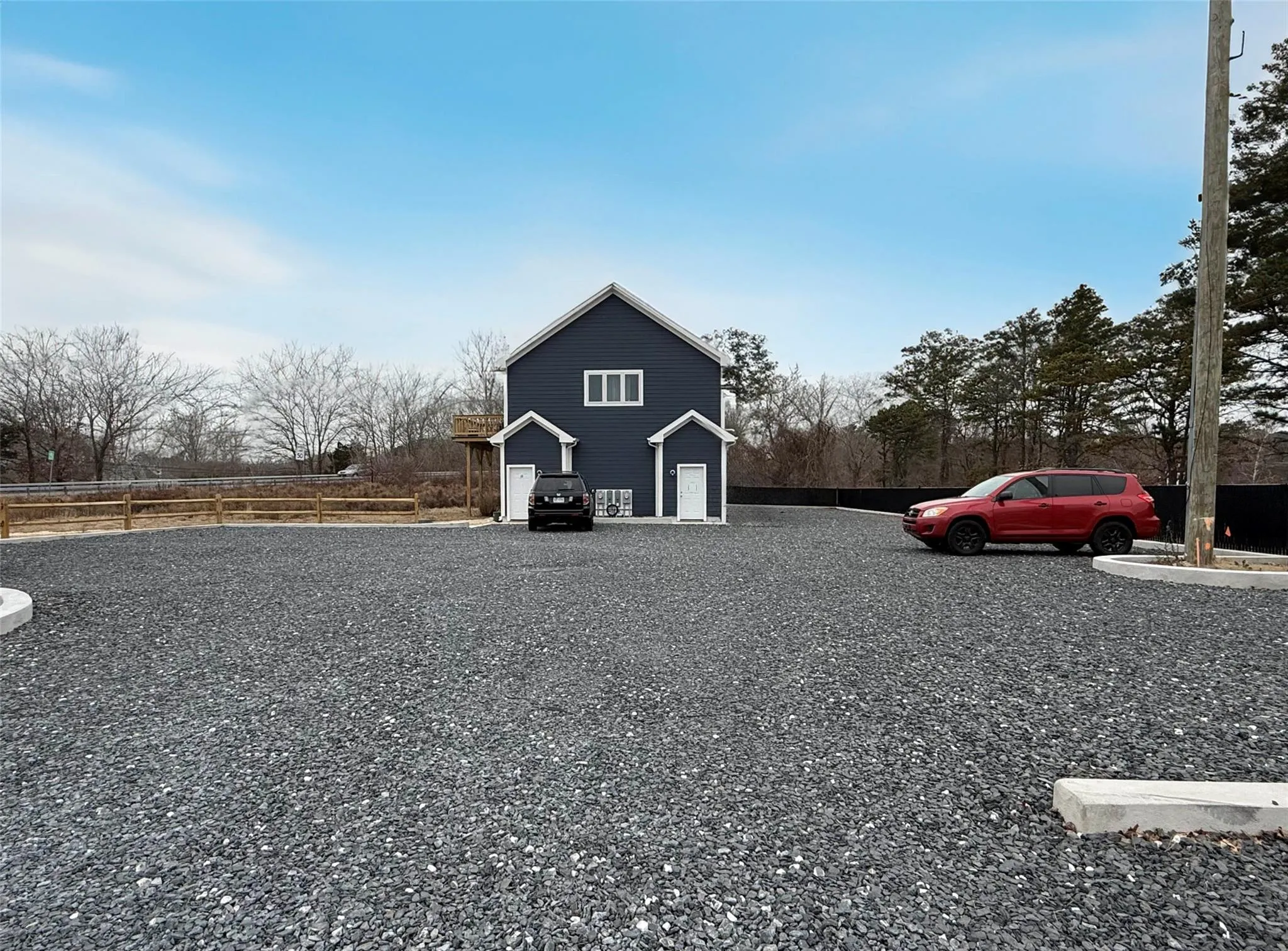 View of side of home with a garage View of side of home with a garage