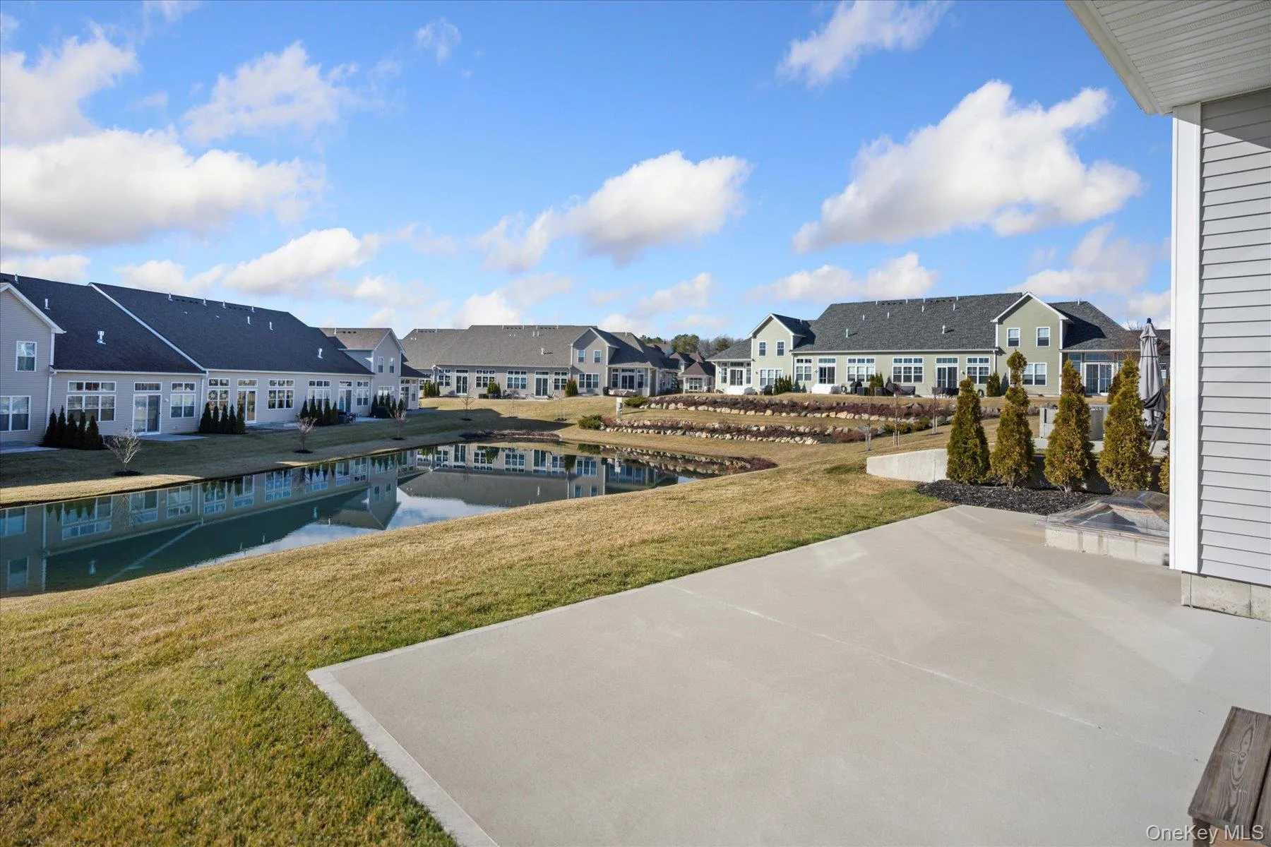 Spacious patio overlooking pond Spacious patio overlooking pond