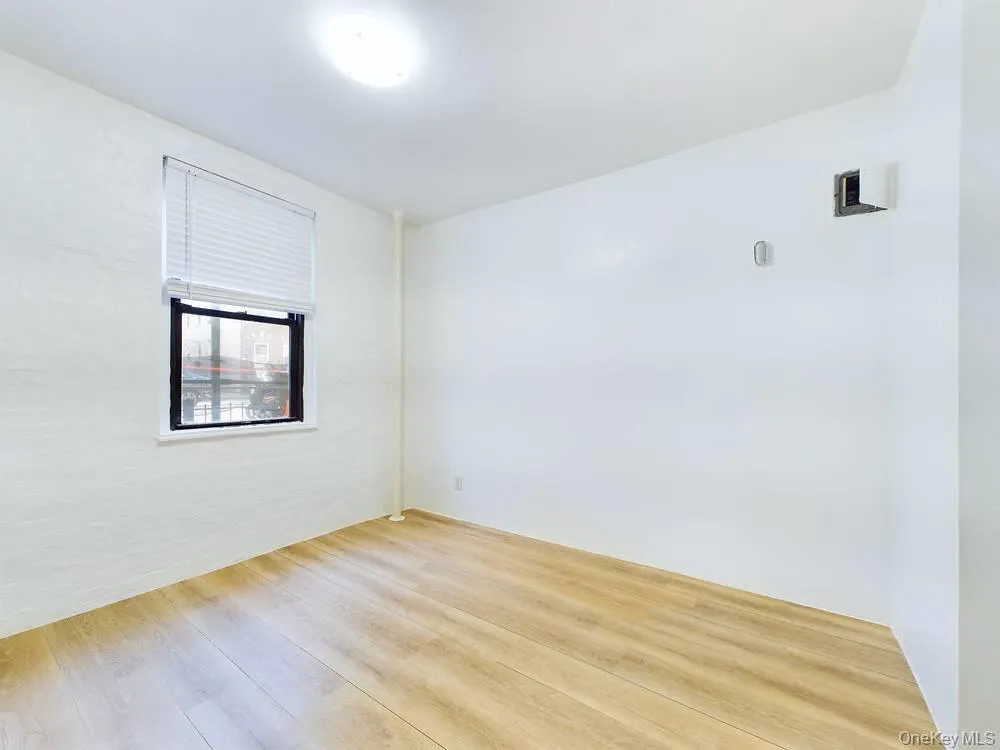 Empty room featuring light wood-type flooring Empty room featuring light wood-type flooring