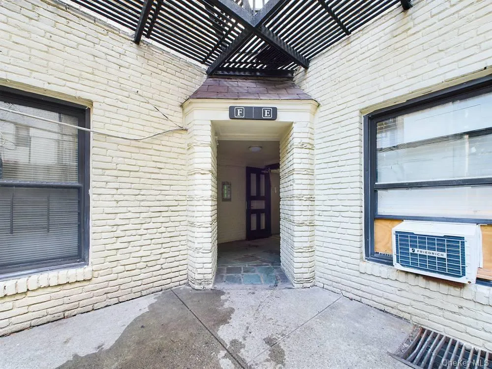 Property entrance with cooling unit Property entrance with cooling unit