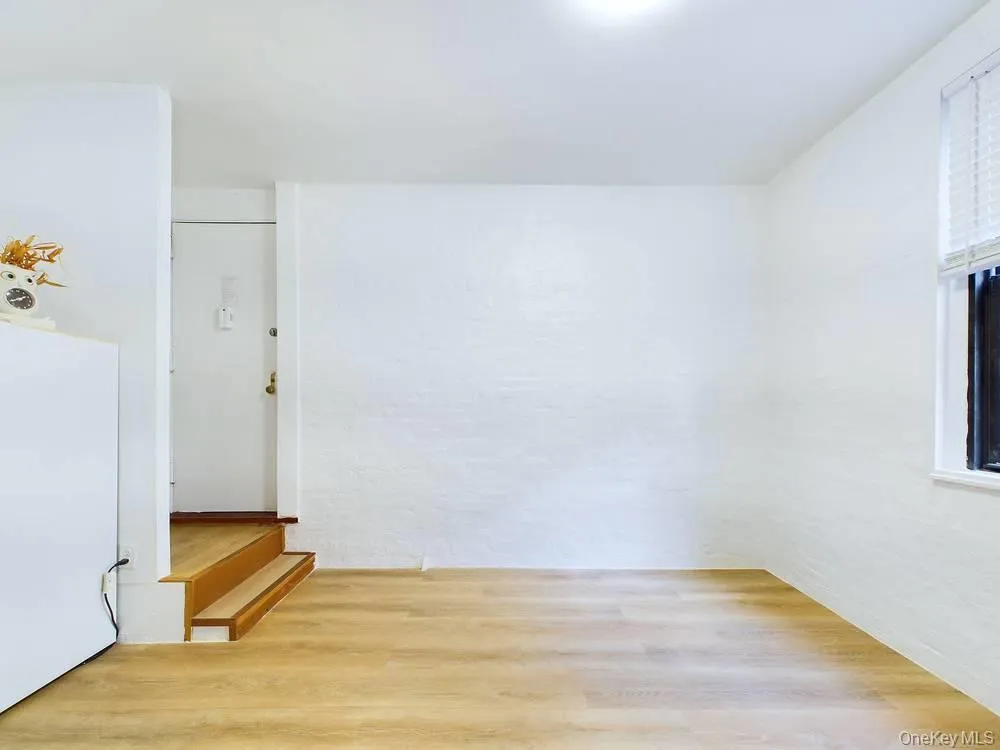 Empty room with light hardwood / wood-style floors Empty room with light hardwood / wood-style floors