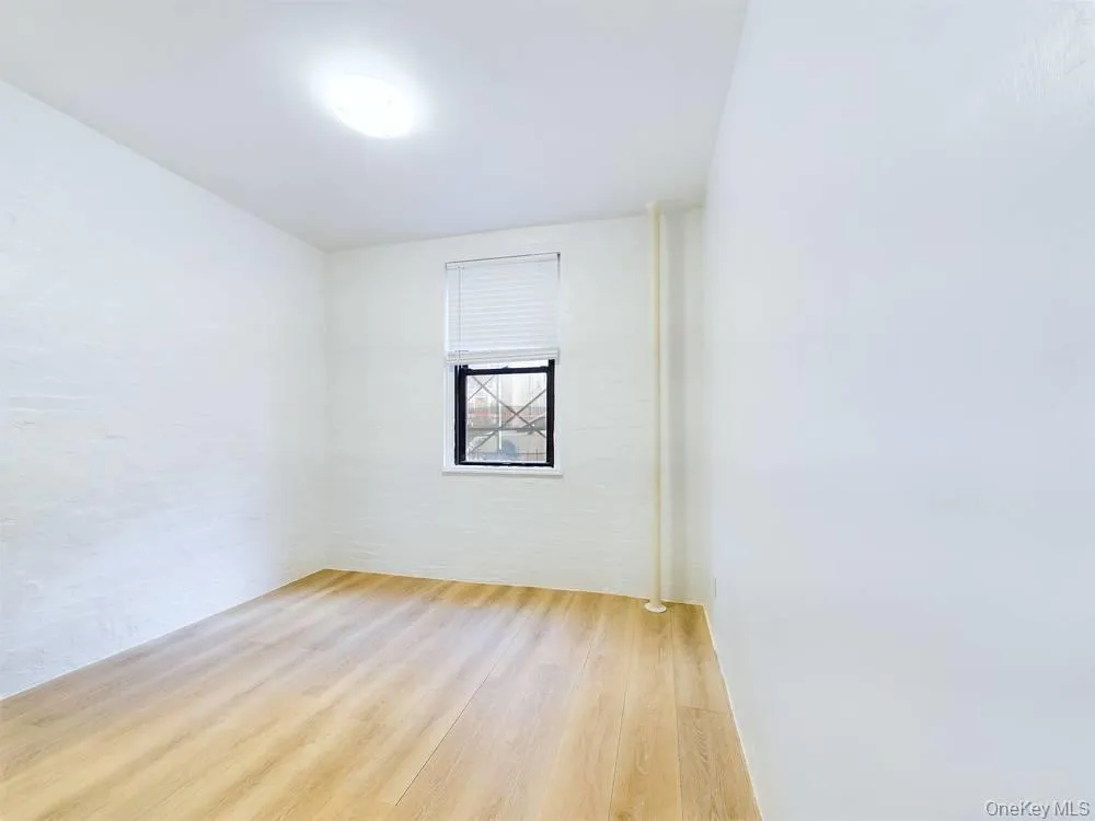 Unfurnished room featuring light hardwood / wood-style flooring Unfurnished room featuring light hardwood / wood-style flooring