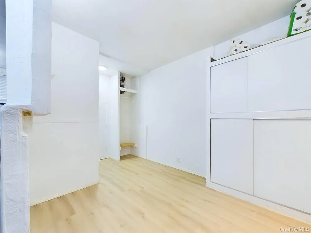 Spare room featuring light hardwood / wood-style floors Spare room featuring light hardwood / wood-style floors