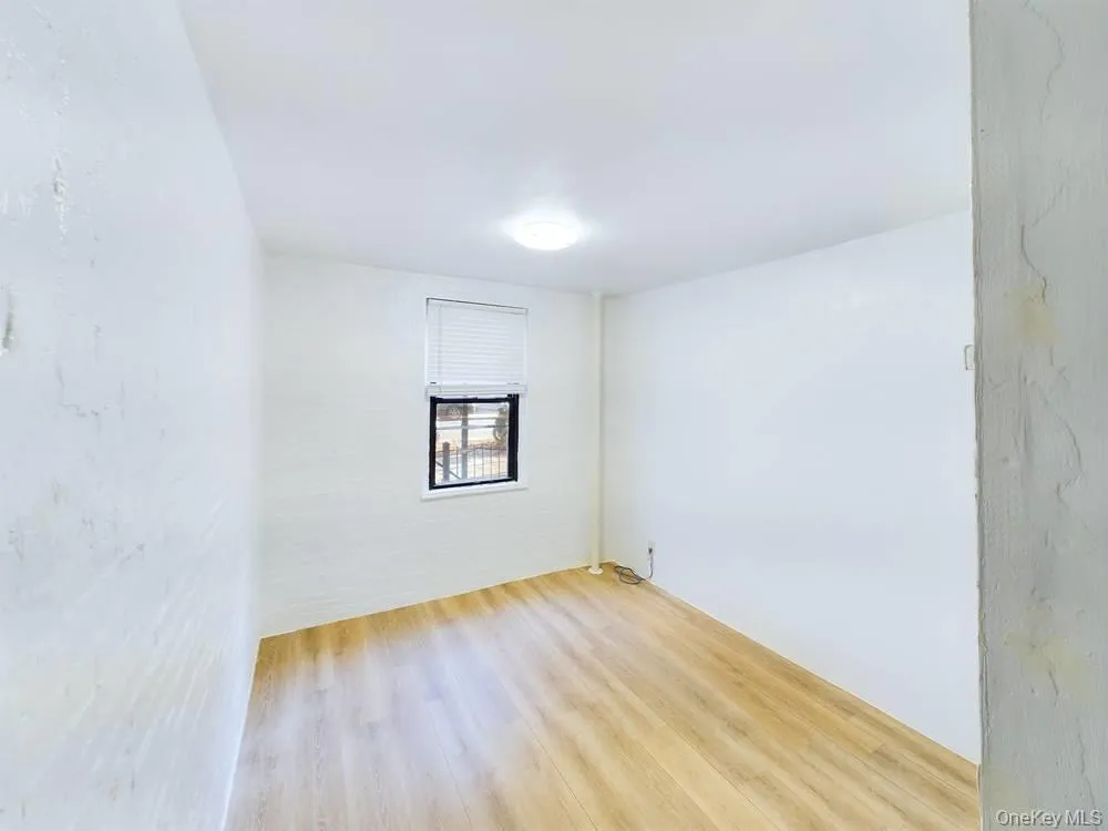 Unfurnished room with light hardwood / wood-style flooring Unfurnished room with light hardwood / wood-style flooring