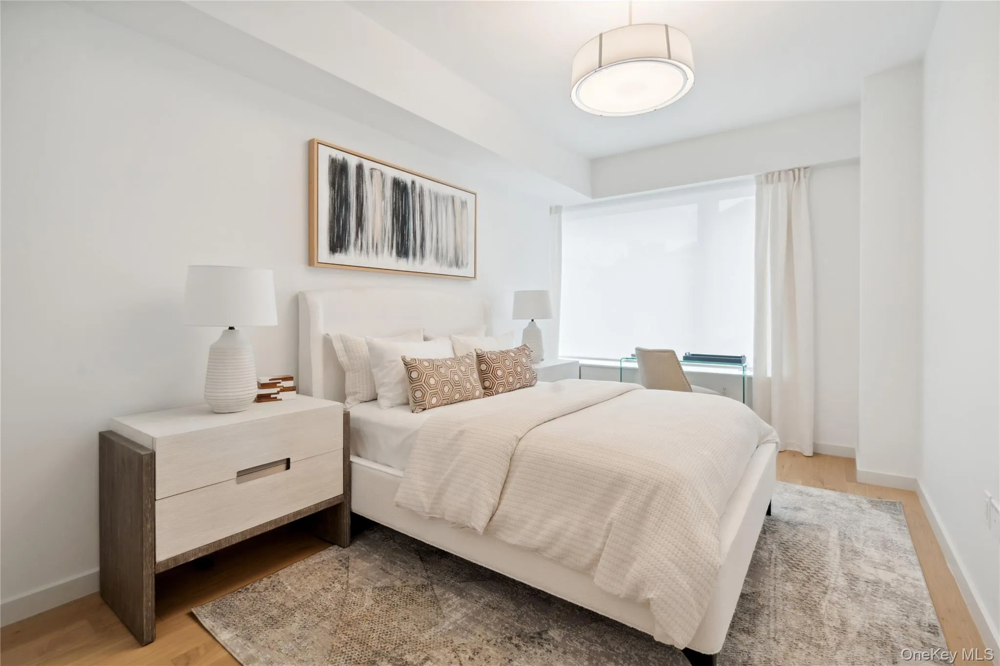 Bedroom with light hardwood / wood-style flooring Bedroom with light hardwood / wood-style flooring